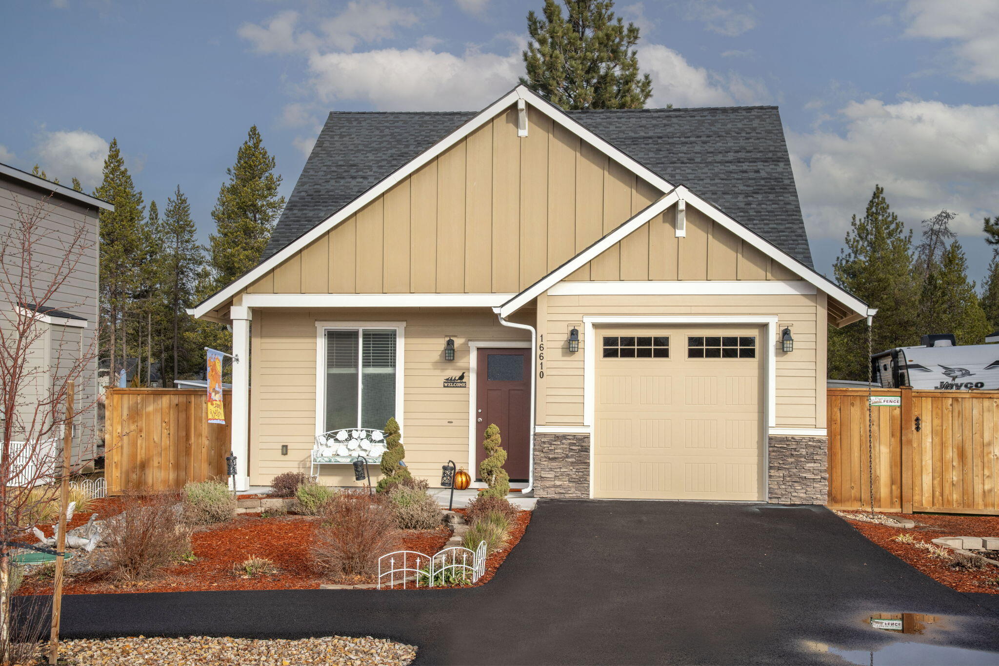 Welcome to this beautifully built 2022 Craftsman-style home, designed for low-maintenance vacation living or comfortable year-round residence. Bright and open, the floor plan features soaring vaulted ceilings and an expansive great room with oversized windows that fill the space with natural light. Rich plank-style laminate flooring flows throughout, complementing the home's thoughtful architectural details.
See seller upgrades $27,000!

Standout features
- Chef's kitchen with stainless steel appliances, quartz countertops and ample cabinetry—ideal for everyday meals and entertaining.  
- Main-level primary suite offers a serene retreat with a luxurious en-suite bath and a generous walk-in closet.  
- Additional well-appointed bedrooms and baths provide flexible space for guests or multigenerational stays.  
- Covered porch and park-like, low-maintenance landscaping create private outdoor living and dining areas.  
- Move-in ready, turn-key condition — truly better than new.