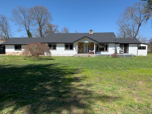 Amazing property! Hard to find, 4, flat, acres on the Rouge River, yet 10 minutes to town. Incredibly easy river access, ''like living in a wild life preserve, perfect for photography. Across the river is a farm., the views are tranquil and birds abound.

The house has been COMPLETELTY remodeled top to bottom. New roof, HVAC system, well and septic, flooring, bathrooms, appliances, extensive decking, exterior and interior painting, name it.... Two suites, each with incredible bathrooms, large tubs and amazing views.

Set back from the road, it feels like your own slice of heaven. Lovely garden space. Large 30x60, high ceiling shop space. Long driveway affords privacy. It really has it all. 

This special property is ready for it's next owners. It is truly a gem of the Rogue Valley.