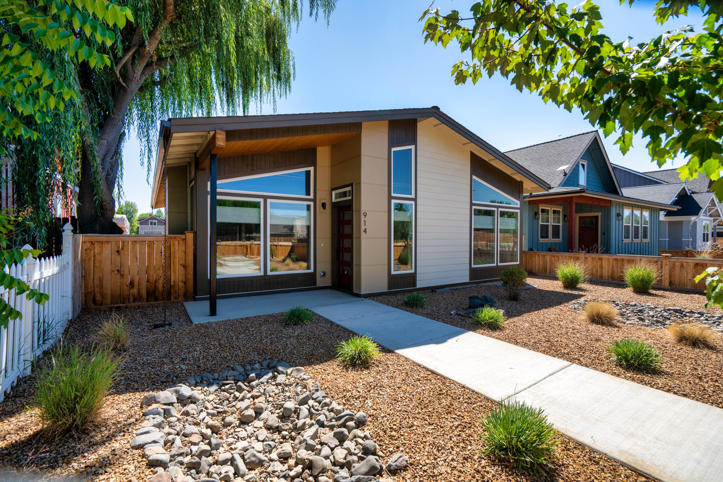 Built in 2023 and lightly lived in, this modern single-level home blends style, comfort, and function in a prime Redmond location. A thoughtful floor plan features a welcoming mudroom, hand-textured walls, and sleek modern finishes. Home is move-in ready with a refrigerator & window coverings already in place. Enjoy ductless heating with individual zones in each room for customized comfort. The spacious primary suite offers a large walk-in tile shower and custom closet package. Low-maintenance xeriscape landscaping keeps upkeep minimal, and a finished garage adds versatility. Located near Redmond's new Dry Canyon Club and steps from scenic walking and biking trails, this home provides easy access to recreation, community events, and nature. Perfect for those seeking modern amenities, efficient design, and an unbeatable location, this property delivers a truly turnkey lifestyle.