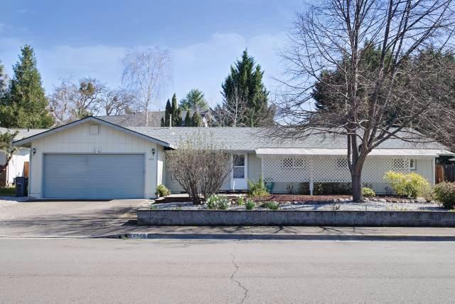 Hard to find affordable 4 bedroom home in the coveted Lone Pine School District! You'll love this immaculately cared for single level ranch-style home, on a quiet cul-de-sac. Enjoy its open and spacious formal living and dining room and additional family room with newer gas fireplace insert and sliding doors to your shaded covered patio for outdoor living, perfect for entertaining. You'll love the kitchen with the breakfast bar and laminate flooring. Lots of room in your 2-car attached garage. The in-ground sprinklers, patio, shed with 220 amp, RV parking, and beautiful mature landscaping in your private backyard provide a wonderful escape from the cares of the world.