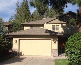 Deschutes River frontage - a wonderful place to get away from it all & enjoy the peaceful/beautiful river setting. 2001 Built townhome w/gated entry to front door,50 year tile roof, slate & wood floors throughout main level, Open & bright great room w/built-ins, gas fireplace. 2nd Floor Master Suite w/gas fireplace & private deck overlooking the Deschutes. Master Bath has tile flooring, radiant floor heat, spa tub & tile shower, large walk-in closet. Step out your back door to kayak, fish, etc.