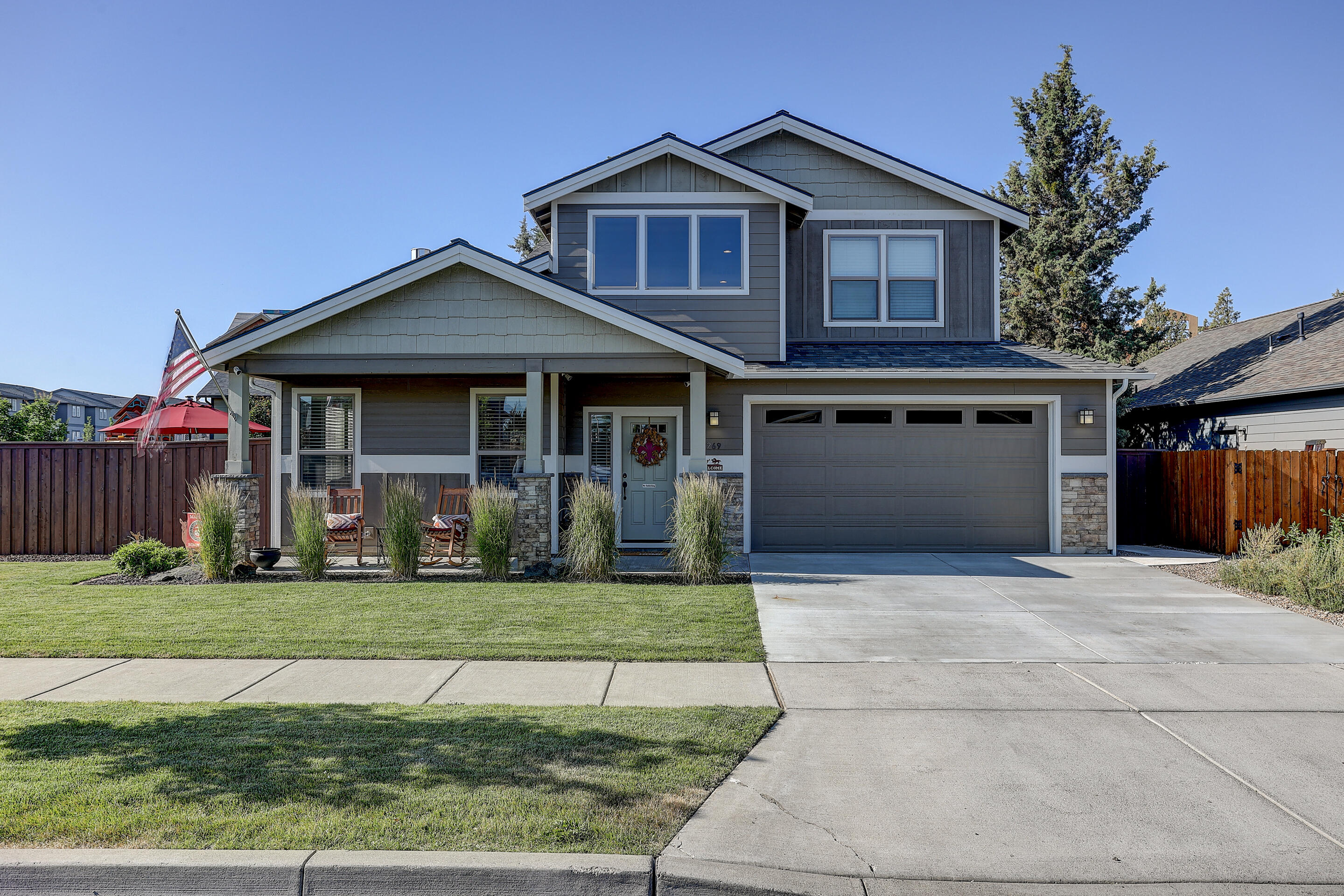 Vacant and back on the market at no fault to seller. Appraisal is over list price, don't miss out!
Impeccable condition with gorgeous craftsman finishes! 2016 Ross Built Home solidly engineered with upgraded finishes throughout. Contemporary design incorporating quartz countertops, stainless appliances, and soft close cabinets/drawers. Custom, locally-crafted, solid-wood cabinets with oil rubbed bronze hardware. Floor to ceiling stone fireplace with custom made wood mantle. Customized 2'' faux wood blinds. Oversized coat closet that continues to wrap under the stairwell. Master suite on main level has floor to ceiling tile shower with custom rock floor and large walk-in closet. Upstairs boasts an open bonus room, 2 large bedrooms and full bath. Fully fenced backyard featuring board on board design for complete privacy. Included is the playground, 7x7 shed, deck box, and stairway mirror. Natural gas BBQ stub plumbed to backyard patio. Oversized garage with a 30 amp RV outlet on the side