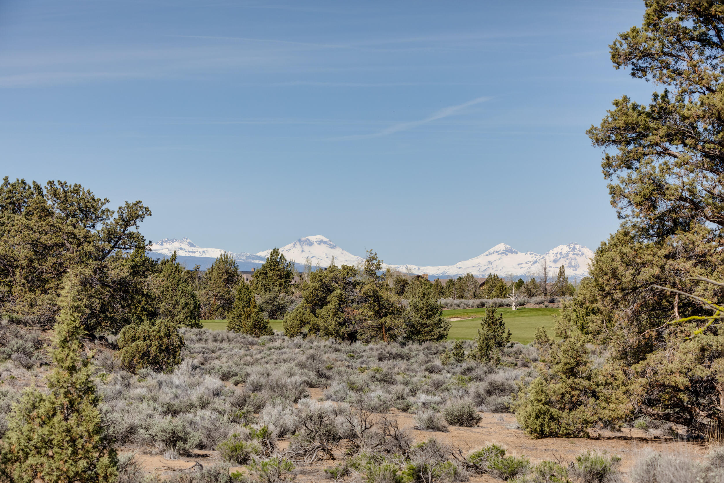 Cascade Mountain views do not disappoint on this homesite at Juniper Preserve! Situated on the 8th fairway of the prestigious Jack Nicklaus course. A generous  0.59 acre site is located near the front gate of the property for easy access to getting into Bend or the airport for traveling. With approximately 150' feet of open space from the rear of the lot to the golf course gives you unobstructed views of the golf course and Cascade Mountains.  Enjoy all the benefits of being a member of the Pronghorn Club! 36 holes of Championship Golf on the Fazio & Nicklaus courses, Troon golf benefits, Private Members Club, Restaurants, on-site Market, Concierge Services, Day Spa, Pools & Hot tubs, Fitness & Wellness Center, Staffed 24-hour Gate, Pickleball, Dog Park, trails and access to public lands. Includes full Pronghorn Premier Club Membership Deposit.