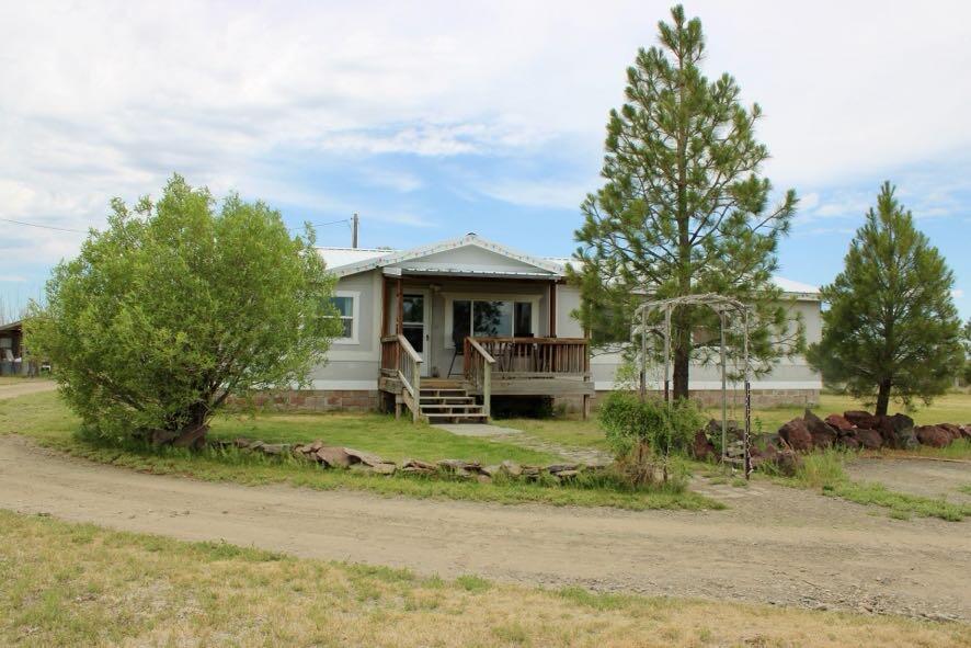 This 2.41-acre property is ideally located in the heart of Christmas Valley and features a spacious 4-bedroom, 2-bath manufactured home plus a fantastic 720 sqft. mechanics dream shop.Perfect for all your projects, hobbies, or storage needs. Enjoy wide-open skies, peaceful surroundings, and stunning views, ideal for relaxing in your hot tub after a long day. The property also offers a great pasture area for livestock. Situated on a quiet loop with easy road access and just minutes from town amenities like gas, groceries, restaurants, the golf course, and the famous Christmas Valley Sand Dunes. This level lot has plenty of room to grow, play, or build your future. Come experience the beauty and freedom of Christmas Valley living.