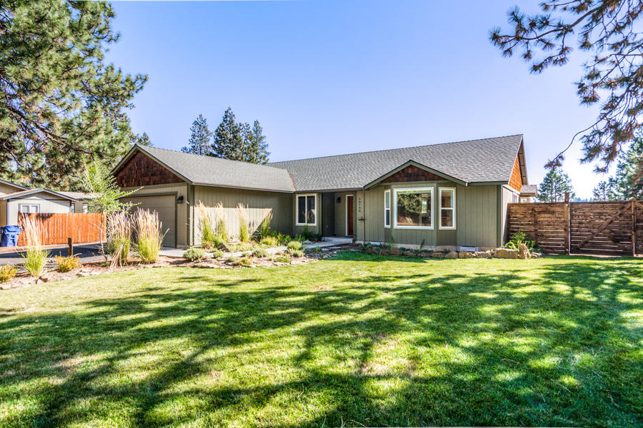 Single level home with vaulted ceiling and spacious living room and located in a wonderful neighborhood near the Deschutes River. All of the great amenities right in your backyard! Fully fenced and landscaped, this backyard is a dream for anyone who enjoys the outdoors. Pavered patio, raised garden beds, fire pit, corn hole pit, greenhouse, two sheds, and it's huge! Easement access to the Deschutes River within a short distance, as well. Plenty of RV parking and 220 near. Room for a boat or other toys, too. Plum, cherry, and apple trees in the front yard. Fresh interior paint and upgraded insulation throughout. Great neighborhood and a home that's move in ready!