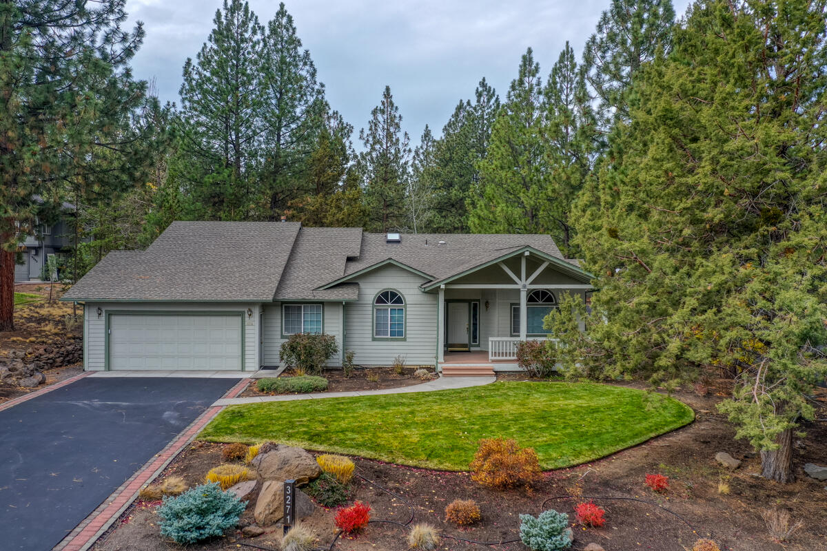 NW Bend single level home in the sought after Awbrey Glen neighborhood. Very clean has been used as a second home. New roof and solar skylights as of August 2025. Vaulted ceilings, living room with dining area and additional family room off the kitchen with gas fireplace. A great gathering place with large kitchen with center island open to the family room. Sliding glass doors to deck off the kitchen, surrounded by native landscaping. The layout is perfect for privacy, flexibility and maximizing the space.  Three bedrooms and two baths, 1876 sq. ft. home on a .33 acre lot. Oversized 2 car garage with work bench and room for storage. Yard is fully landscaped and well maintained with sprinklers front and back. Neighborhood includes parks, walking trails, playgrounds and snow removal. SELLER WILL GIVE BUYER $20,000 CREDIT TO BUYER TOWARDS BUYERS CLOSING COSTS AND ANY PRE-PAIDS.