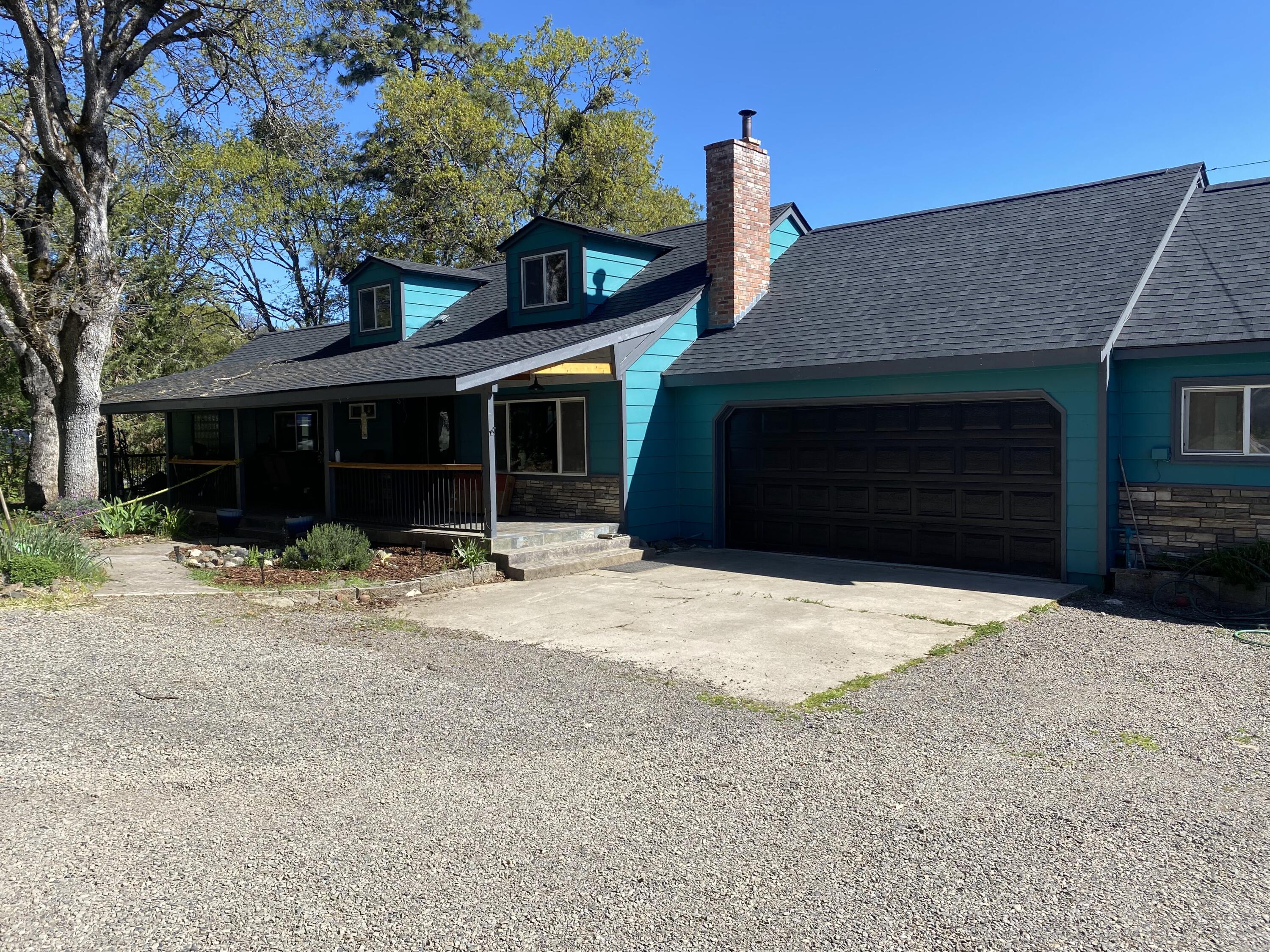Seller offering 10k concessions to be use only for closing costs - limited to escrow and title fees, interest buy down or repairs only. Black Friday special!

Total 5bd/4ba on 1.5 acres with 2 separate units.. 3/3 main home with additional large bonus room off garage, + studio apartment above shop.

Renovated 2 years ago: painted inside and out, wood floors refinished, designer fixtures, stone counter tops, live edge shelving, floor to ceiling windows looking out towards Mt. Mclaughlin. Master suite downstairs with walk in closet and jacuzzi, walk in showers and built in bluetooth speakers. 

Expansive decks front and back, with views! 16gpm well, pool and fish pond, pasture, fully fenced, seasonal creek, established landscaping, orchard (peach, cherry, plum, apple, pear, elderberry, currant, fig), raised beds and grape vines. Garage and large bonus room w/ separate entry and deck. Separate 800sf shop with 220, 4'' clean out, trailer parking and rented apartment above. Desirabl