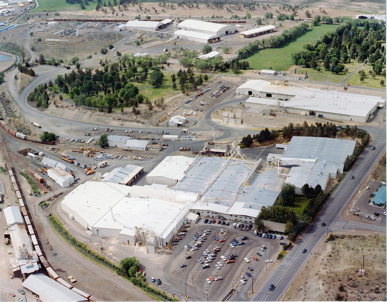 This is a great long term investment opportunity with a large manufacturing facility in Prineville Oregon. Contact Industries, which has been in business for over 70 years, recently executed a 20 year absolute NNN lease on this 82 acre complex with approximately 555,000 square feet under roof. Contact Industries is currently paying $480,000 annually and there are annual escalations ranging from 2-3%. The facility was built in 1955 and was extensively remodeled from 1998 to 2008.