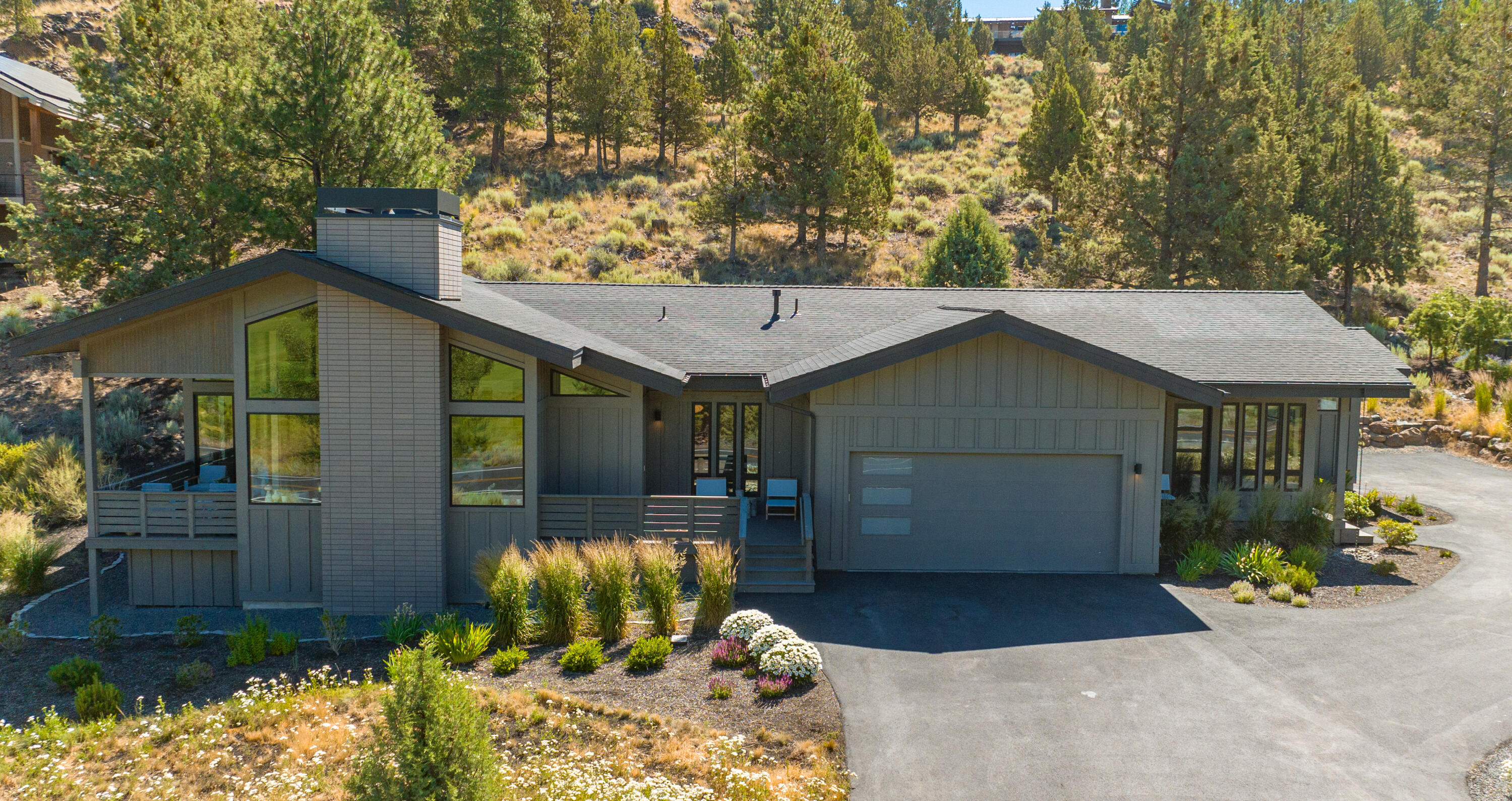 Incredibly hard to find modern single level home w/ attached apartment and extra sprinter bay garage in NW Bend! This better than new home features 2300 sf of total living space across 3 bedrooms, 2 bathrooms, + office in main home, and attached apartment complete with full kitchenette, full bath w/ stackable washer/dryer, dining room, and bedroom w/ closet + bonus loft area w/ access ladder not included in the square footage. Multiple outdoor spaces across this .91 acre lot include front deck w/ views of the golf course and beautiful sunsets, rear patio, separate front deck w/ access to the apartment, and plenty of rear space to add your own personal touches. With multiple quality features and finishes, as well as Earth Advantage Certification, numerous neighborhood amenities, and access to several trails from within the neighborhood, this property is an absolute must see.