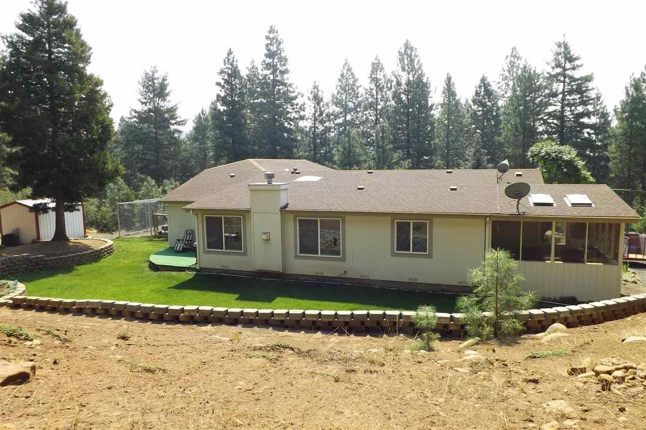 Lovely triple wide manufactured home, Beautifully Set Up. Pride Of Ownership Apparent Everywhere, Nice Landscaping, Bordered By Blm On Two Sides, Attached Garage And Shop, Really Nice Home That Has Been Well Cared For. Shop And Garage Are Insulated, Partitioned Dog Run/Kennel Siding Is R21, 5 1/2 Fiber Glass, Enclosed Screened Spa Room With Sky Lights Off Of The Master Bedroom, Very Private And Quiet But Yet Not Far Out. Open Floor Plan , Walk In Closets, Sky Lights, Lots Of Wild Life To Watch.