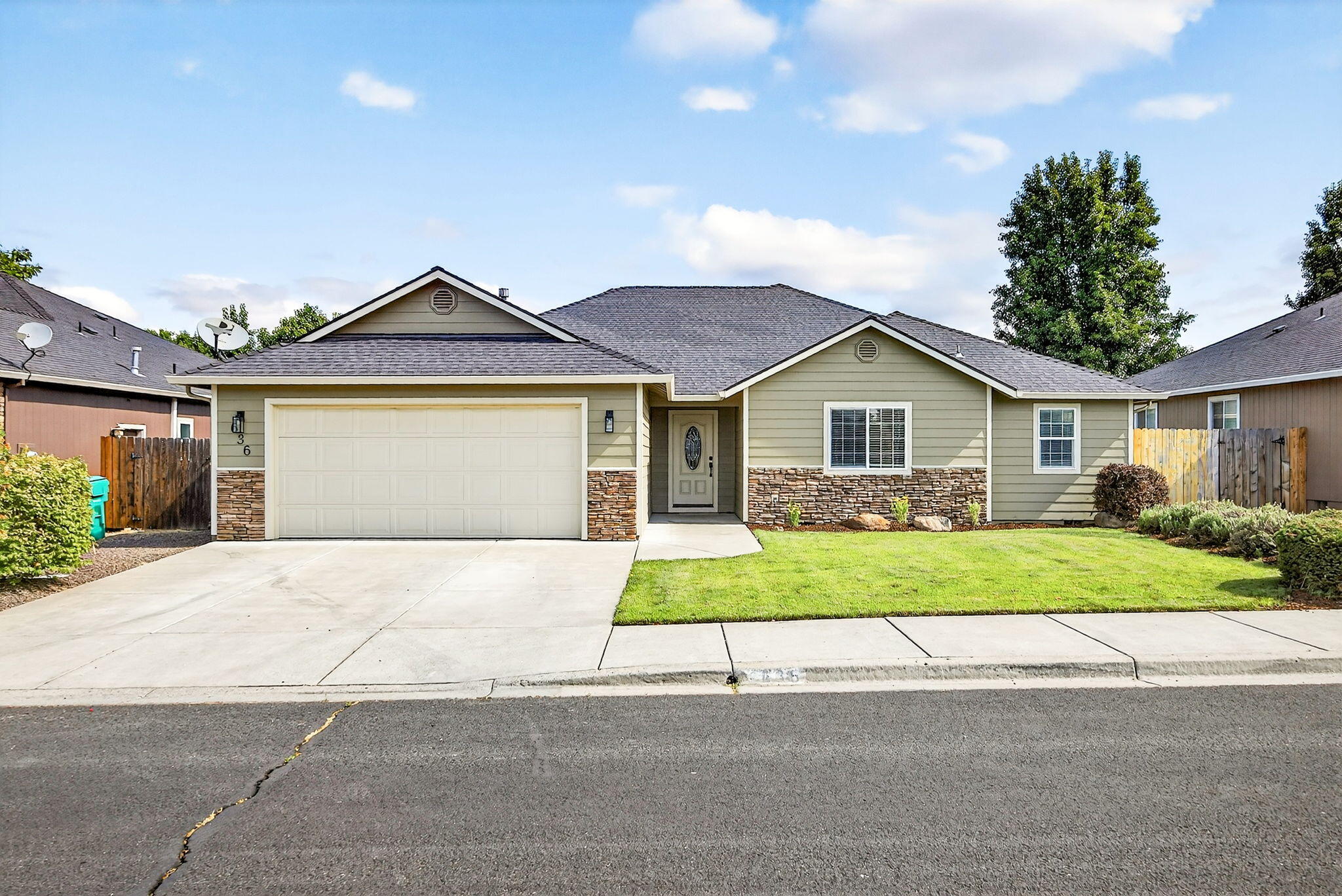 This home has been recently updated with new interior paint, LVP flooring, carpet and lights.  This  4-bedroom, 2.5-bath home offers 1,987 sq ft of well-designed living space, including both a living room and a family room-perfect for entertaining or relaxing.  The layout flows seamlessly from room to room, while the generously sized bedrooms provide comfort for the whole family. Located on a large .18 acre lot, with a raised garden bed and separate dog kennel in a convenient neighborhood close to schools, parks, and shopping.