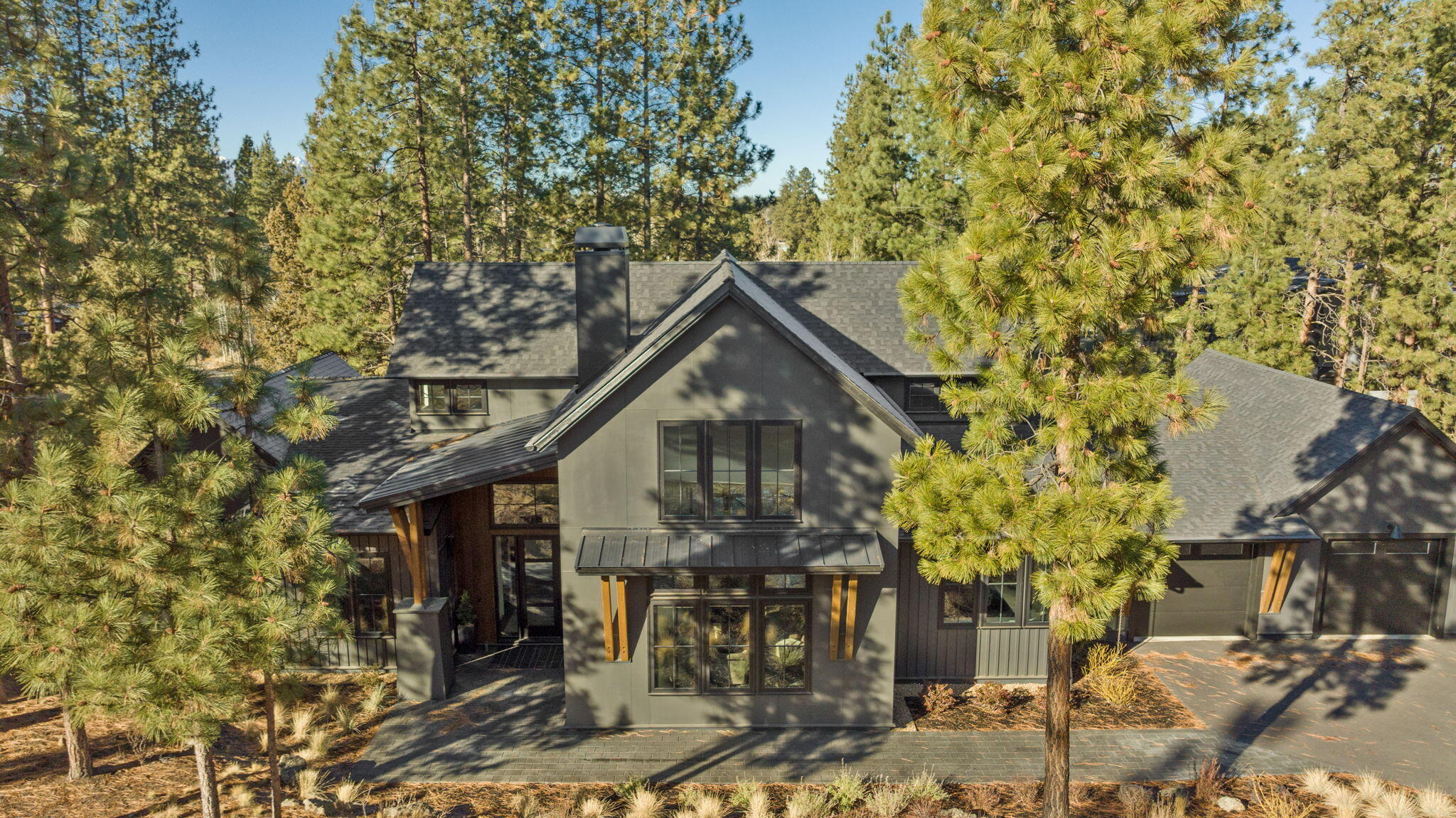 Nestled in the heart of Bend, Oregon, within the prestigious Tetherow golf community, experience the perfect blend of luxury, comfort, and natural beauty. This stunning property boasts modern architectural design, high-end finishes, and thoughtfully curated living spaces that exude sophistication. Large windows frame the surrounding nature and allow incredible natural light. The open-concept layout seamlessly connects indoor and outdoor living. With access to world-class amenities, including an award-winning golf course, fine dining, fitness facilities, and miles of scenic trails, this home is ideal for those seeking an active and vibrant lifestyle. Tetherow's convenient location provides easy access to downtown Bend, the Deschutes River, and Mt. Bachelor for year-round recreation. This is more than a home—it's a gateway to the best of Central Oregon living. Call your favorite buyer's agent for an appointment today!
