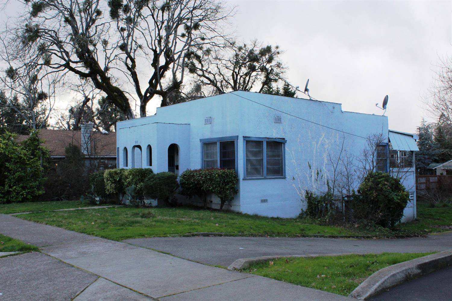 Investor Special! 2 bedroom, 2 bath with detached 2 car garage. Centrally located within Grants Pass on .21 acre. District 7 schools & walking distance to Grants Pass High School. Covered rear deck and large backyard. All information provided is deemed reliable but is not guaranteed and should be independently verified.
