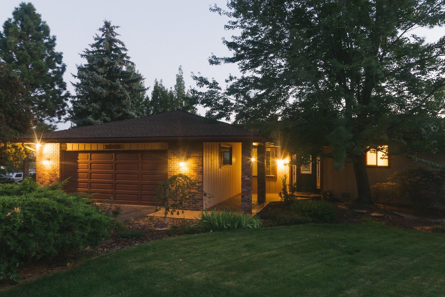 This lovely custom home on a quiet dead-end street features expansive views of the city, the basin and Mt. Shasta which can be enjoyed from nearly every room! Highlights include professional landscaping, a cozy central gas fireplace, an airy, updated kitchen by James Borror Custom Cabinets, a convenient office, a large downstairs rec room, wine storage and new carpet. The master bedroom boasts a generous walk-in closet, a large sliding glass door to the deck and a newly remodeled bath. The two car garage is extra long and wide, providing space for motorcycle parking and additional storage. There is a 3rd tuck-under garage stall with an adjacent workshop. The large deck runs along the entire length of the home. A second driveway offers ample parking for your RV and more. The back lawn is large, flat and fully fenced creating a great space for outdoor enjoyment. The apple, peach and pear trees bear abundant fruit. You will be only the third owner of this carefully tended home.