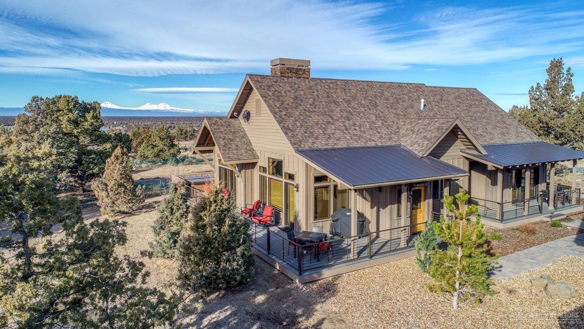 Sage Canyon Cabins blend rustic elegance with casual sophistication. This four bedroom fully-furnished cabin features an open floorplan with a gourmet kitchen, dining and living room areas. Beautiful Cascade Mountain Views are clear from the back patio. Ranch style living is experienced at its finest with beautiful hardwood floors, an inviting fireplace and luxurious interior furnishings. The kitchen is fully stocked with all of the necessities and more to create any culinary masterpiece. All four bedrooms include king beds and are suites. The bathrooms have tile floors, granite countertops and walk-in showers. The large patio is a wonderful place to unwind in the evening as you BBQ on the grill, relax on the patio furniture and enjoy the outdoor hot tub while catching Brasada's glorious sunsets. This cabin is a short walk to all of the resort's amenities making it an ideal location.