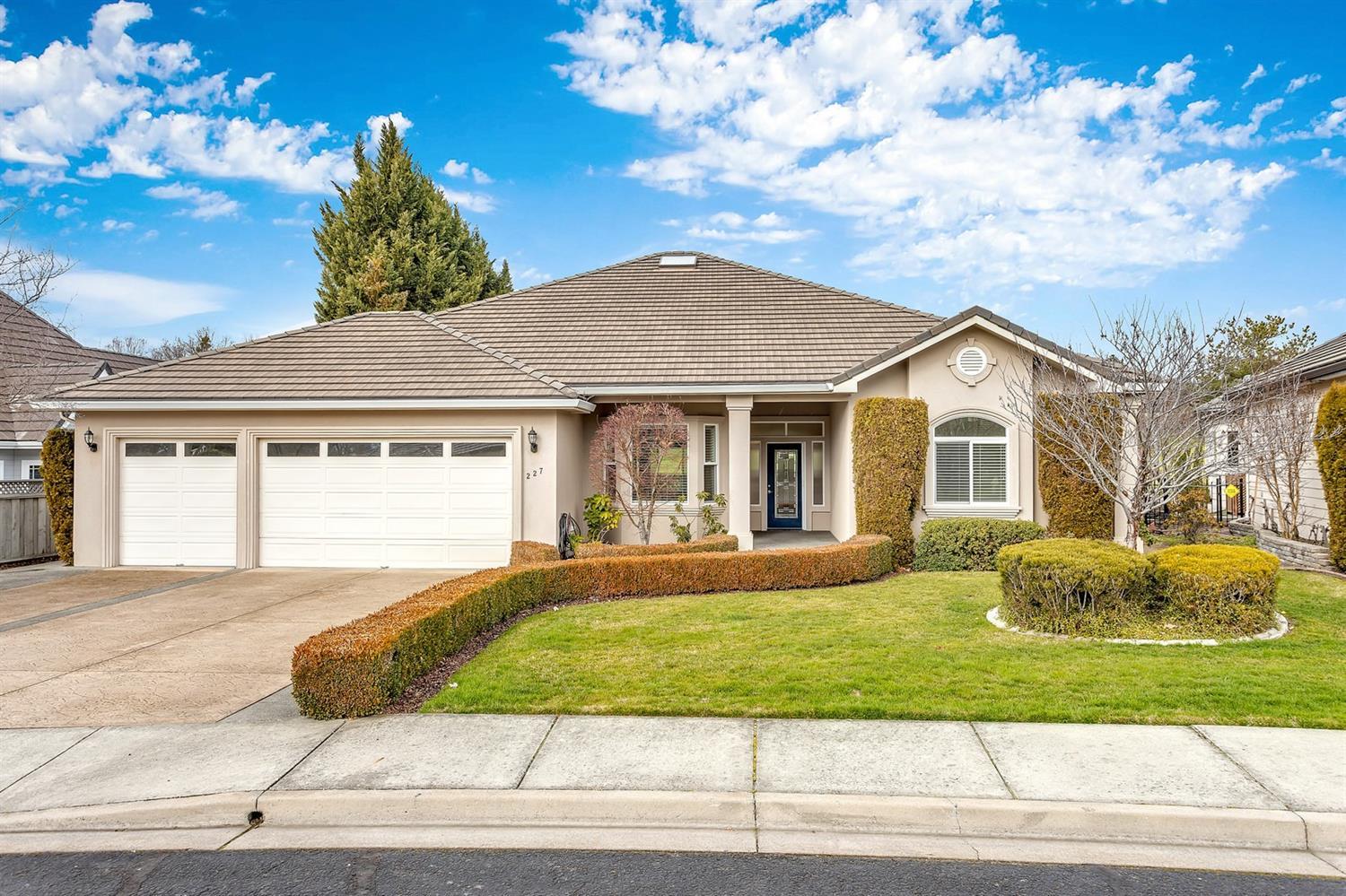 Beautiful custom home in Eagle Point Golf Community. A prime location overlooking 10th & 16th fairways. This home has a great floorplan. The kitchen opens to a wonderful family room with gas fireplace, built in bookcases and sliders to the back patio. Formal living room with gas fireplace and large windows overlooking the golf course. Formal dining room and breakfast room. Kitchen with granite counters, stainless appliances, pantry and eating bar. Master with private covered patio, bath with double vanity, jetted tub, separate shower, tile floors and counter, walk-in closet. Hardwood floors in entry, dining, kitchen, breakfast room and family room. Coffered ceilings, ceiling fans. Stucco home with 3 car garage, stained & stamped cement and tile roof. All this on a nicely landscaped lot in a quiet cul-de-sac close to the clubhouse and restaurant. Hot tub included.