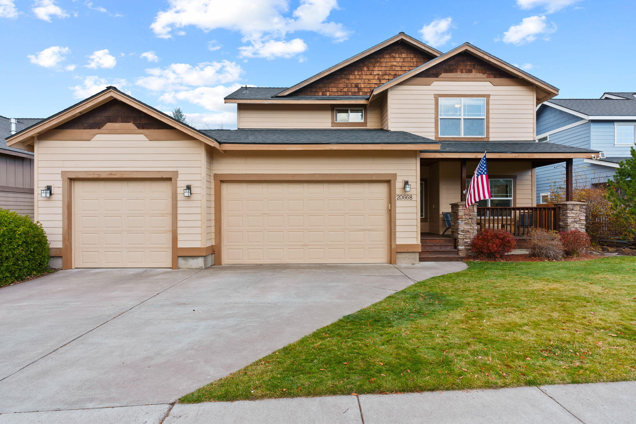 Welcome to this beautifully maintained 3-bedroom, 2.5-bath home offering 2,208 square feet in NE Bend's Yardley Estates. The light-filled first floor features an office, chef's kitchen with newer appliances and cozy gas fireplace. The spacious dining and living areas flow seamlessly to two separate outdoor decks. Step outside to enjoy a paver patio, turf area, and hot tub hookup for future use.  Upstairs, the primary suite features vaulted ceilings, an oversized bathroom with a soaking tub, and a large walk-in closet.  Two additional bedrooms, guest bath, and a large laundry room with sink and folding counter complete the upper level. Practical upgrades include a new roof (2022), LVP flooring and interior paint (2021),  and a rare 3-car garage featuring an EV charger and plenty of storage for vehicles, gear, and toys.