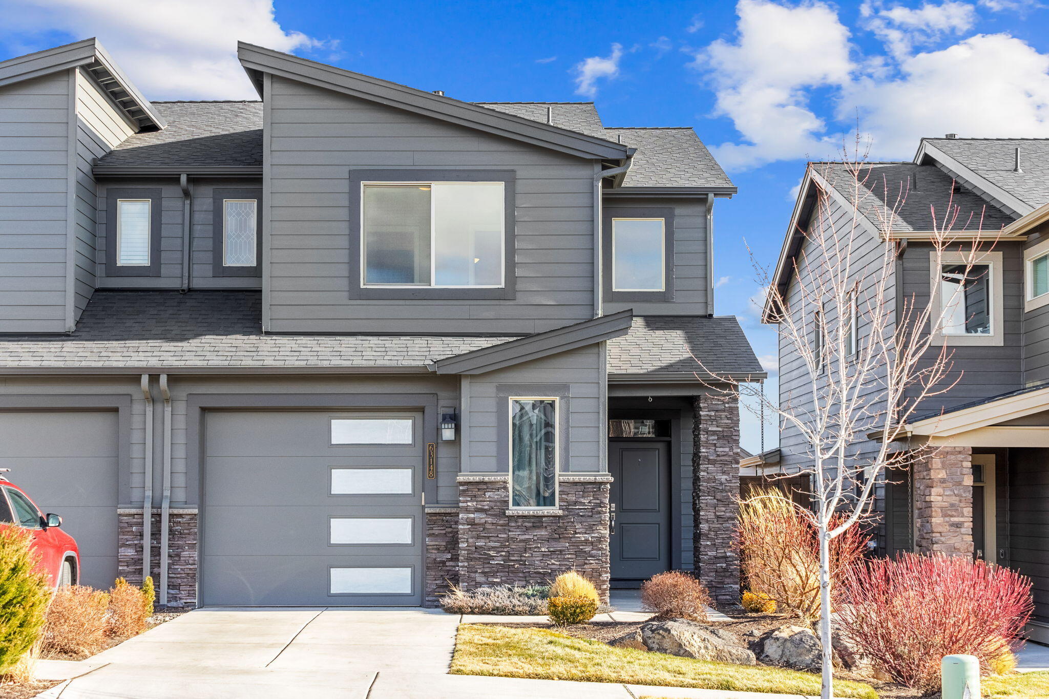 Welcome to your dream home in beautiful Bend, Oregon! This 2016 Pahlisch-built townhome offers the perfect blend of modern elegance and Pacific Northwest charm. All moments away from the popular Boyd Park, and easy access to all things Central Oregon. 

Oversized 1.5 car garage provides ample room for all your storage and recreation needs. 

Upon entry, you're greeted by an open concept first floor with high ceilings, and a generously landscaped backyard with covered patio. 

Upstairs the Primary Suite offers privacy from the guest bedrooms, as well as a large primary bathroom with shower, double sink, and oversized walk-in closet. 

On the other side of the second floor are 2 guest bedrooms with territorial views of the East side high desert landscape. 

HES Score is a 9!

Don't miss this turn-key property in the heart of NE Bend!