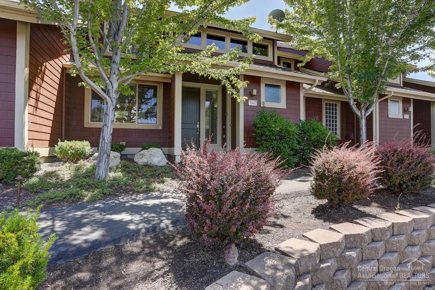Desirable town home in Eagle Crest, Quiet, peaceful and away from the traffic. Great income potential income, approximately $30,000 per year! Large open floor plan with high ceilings and windows. Kitchen overlooks the dining and spacious living area with fireplace and ceiling fan. Master bedroom on the main floor with tiled master bathroom, double sinks, and soaking tub. 2 bedrooms upstairs with a loft or sitting room area. Nice upgrades include tiled fireplace, slate look tile flooring throughout the dining area, New heating system installed last year, built in tv cabinet, and a large patio - perfect for entertaining! Excellent reviews on VRBO! Home comes with 13 month home warranty with HWA.
