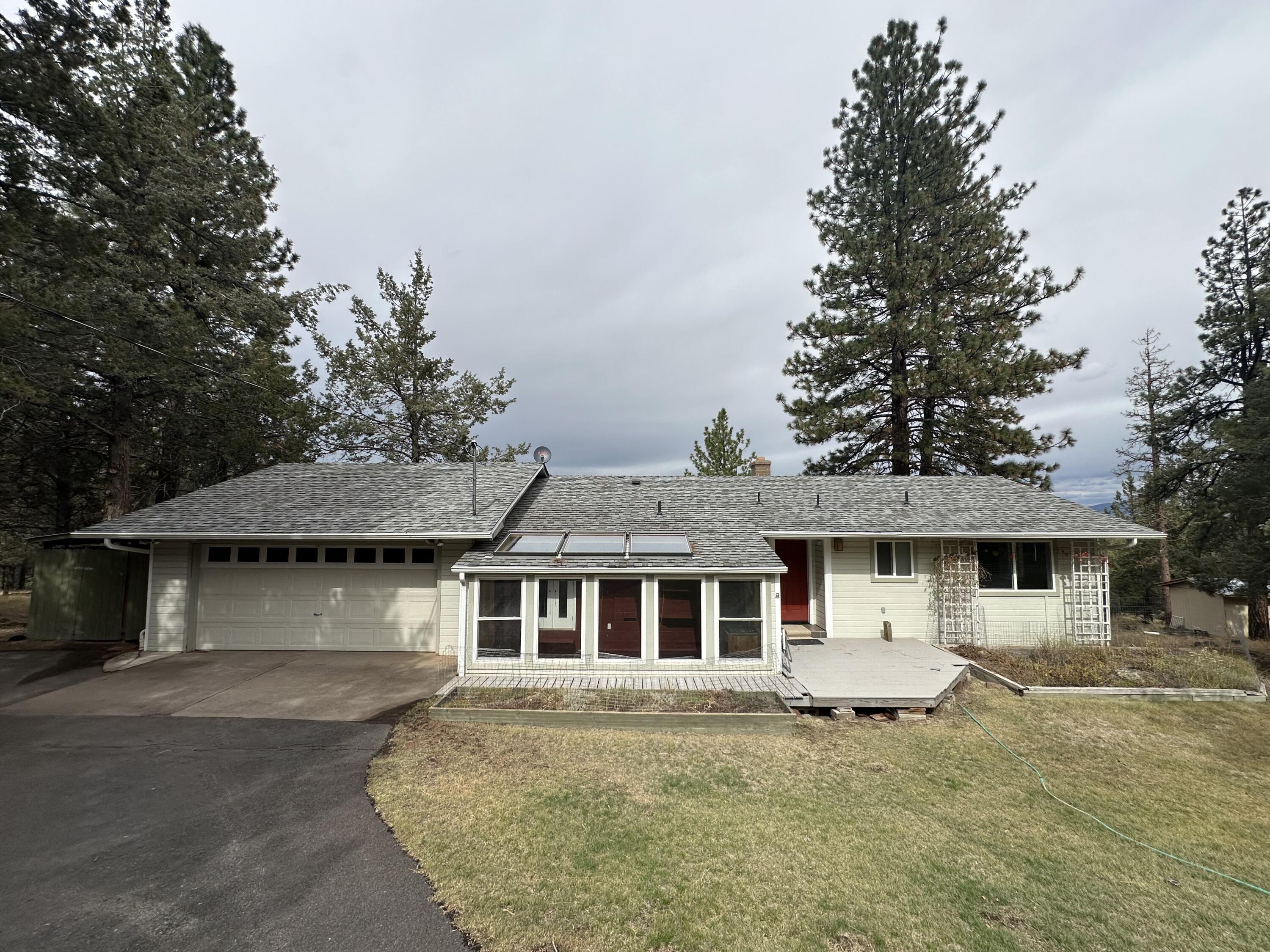 Cedar Trails in Keno is the setting for this spacious 4 bedroom home on 5.19 acres  The panoramic view from the great room overlooks the mountains, lake and the Klamath Basin.  Property has been home for horses and has some fencing.  There is a primary suite on each level.  Attached greenhouse/sunroom is attached to the front of home and offers opportunity for protected gardening.  Area is treed and not densely populated but convenient to  the towns of Keno and Klamath Falls.  Wonderful opportunity to own a spacious home with view and private setting.