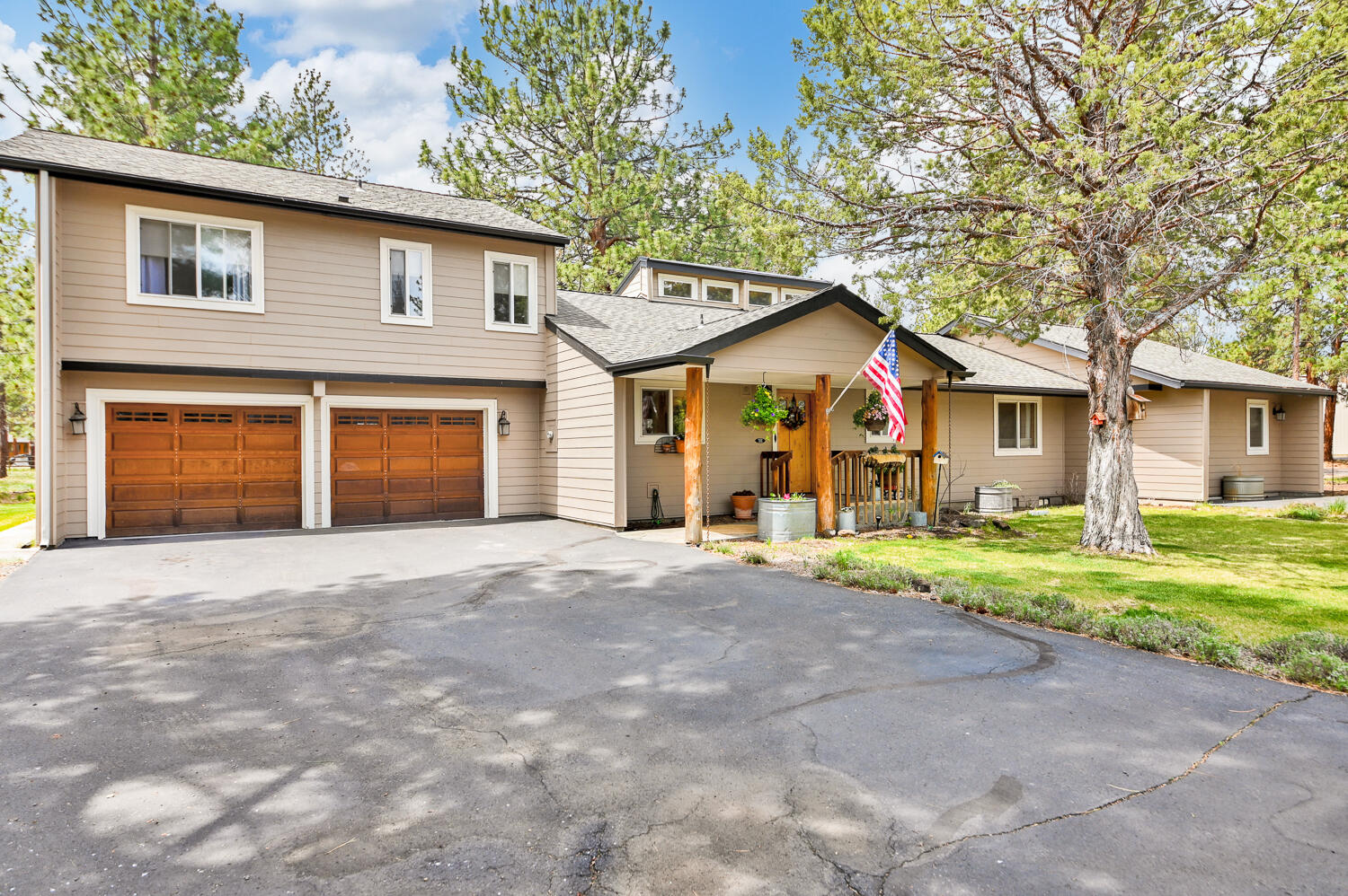 Coveted Indian Ford Meadows property short bike ride from downtown Sisters. 5.56 acres of the best that Sisters has to offer. This multi-level home has 4 bedrooms and 4 baths, large 1920 sq. ft. shop with two roll up doors. Separated primary suite has huge walk-in closet, stand alone claw foot tub, double vanities, walk in shower with travertine and double heads. 3 out of 4 bedrooms are suites with walk in closets, heated floors in 2 bathrooms, fully updated flooring, 1 year old stainless kitchen appliances, pot filler and farm sink, large pergola with pavers, 4 year old roof, greenhouse and raised beds with  deer fencing and drip lines, TONS of storage, wood burning fireplace in the cozy family room, buggy blue pine vaulted ceilings throughout home.