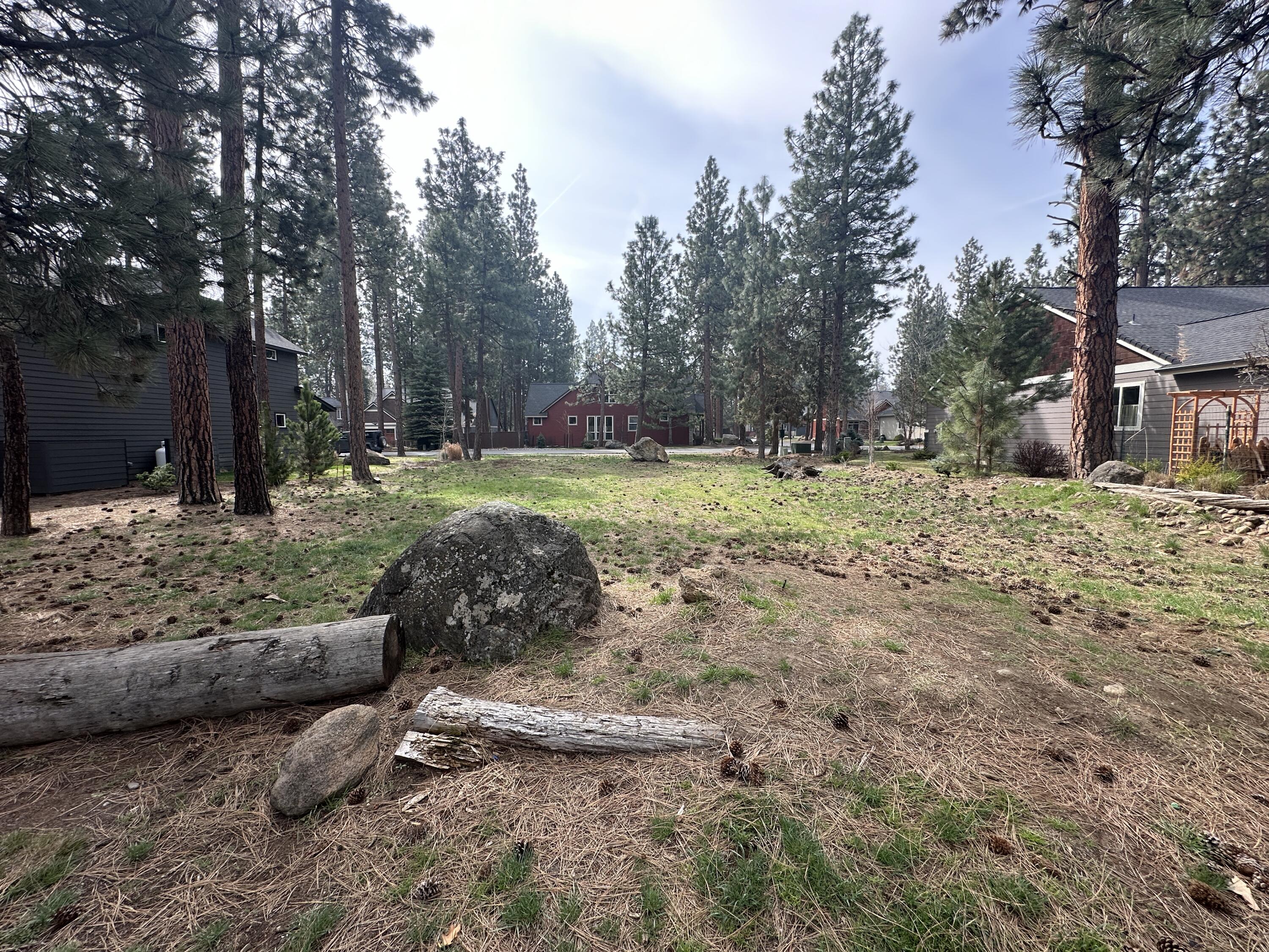 One of the few remaining buildable lots inside the city limits of Sisters and the lowest priced available property. Level, nicely treed lot, in the desirable Timber Creek neighborhood. House renderings and floor plan are of previously permitted plans for a 1738 square foot, single level, 3 bedroom & 2 bathroom home on the property. Seller is a licensed contractor and is available to build that home or help plan and build a home of your choosing. Great location that is very near all that downtown Sisters has to offer.