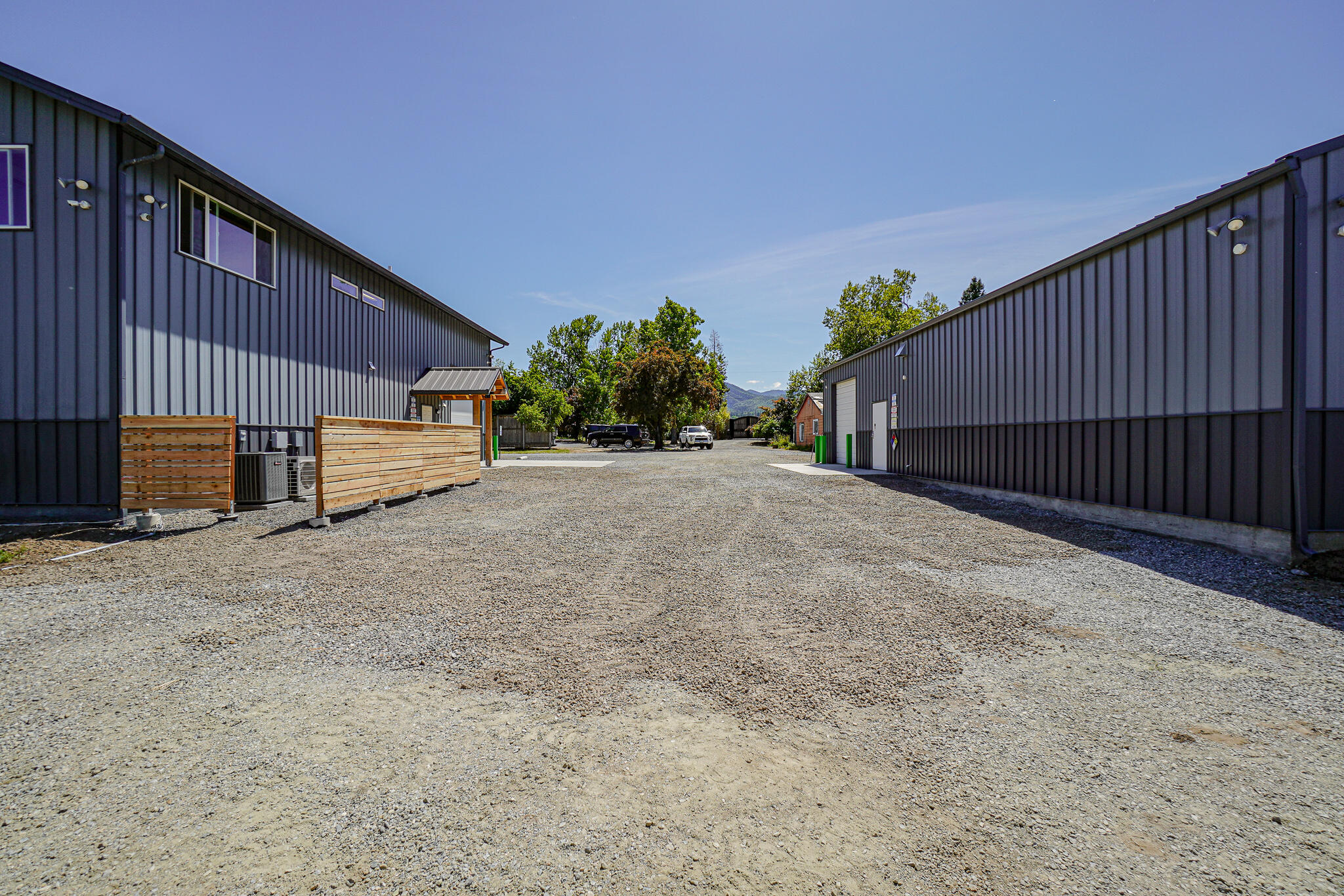 Hard to find! 4 Legal buildable Parcels with 22.02 acres with individual addresses all zoned EFU w/ TID irrigation rights & pond & an 80 Gallon a minute well! Two custom built buildings on the property with one being a county approved 3600 sqft high end commercial building with commercial kitchen, tons of upgrades, compressed air, and fully networked w/ security. Building 2 2400Sqft Ag building with 400 amps and is insulated for energy efficiency and is ready! Just a few of the upgrades, permitted 8' fencing, 4500 gallon holding tanks, drip systems, private offices, power everywhere, gas endless hot water heater, 2 gas furnace heaters /AC and much more. Please reach out to the listing agent for asset list and all details. Too much to list. Option to possible owner carry.
