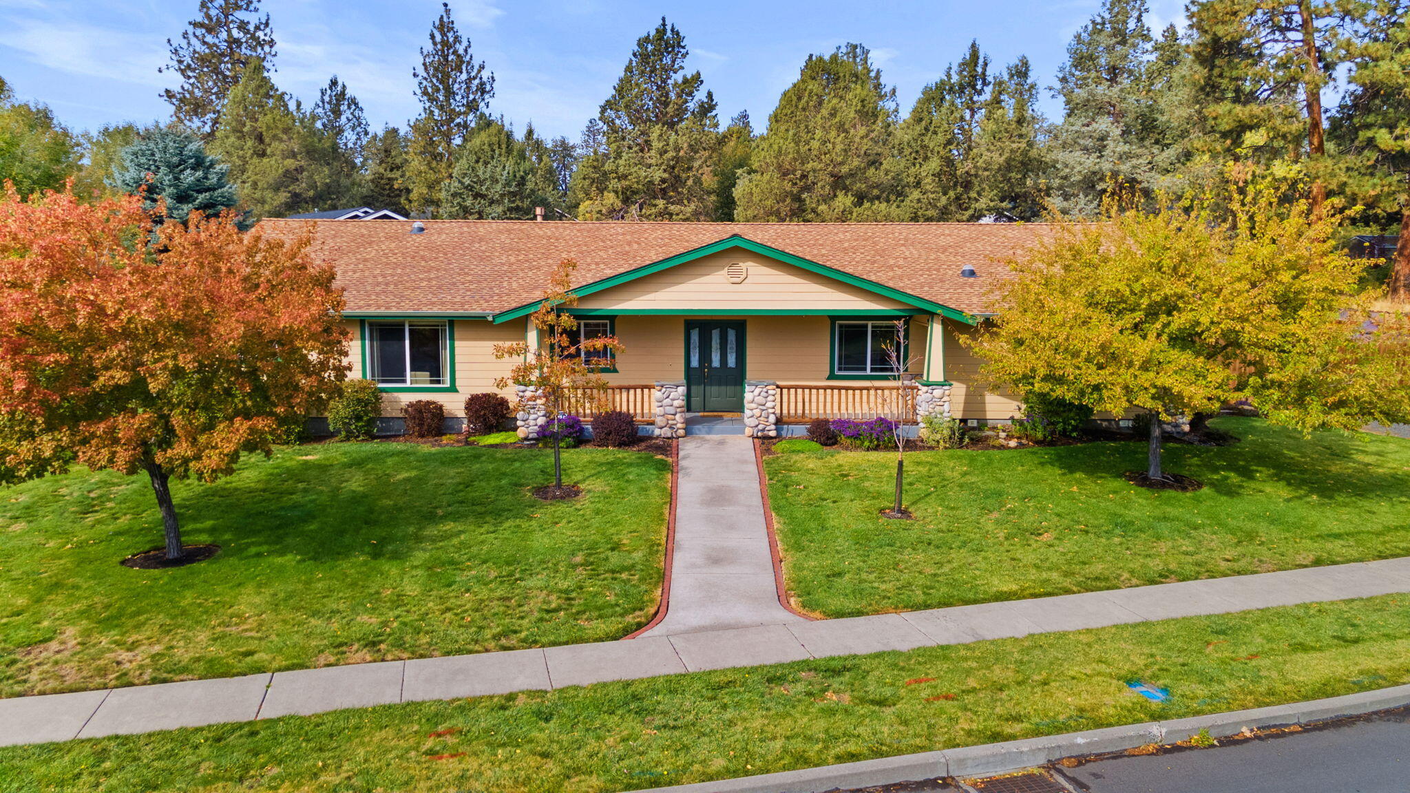 Discover the perfect blend of comfort and functionality in this single-level home on an oversized corner lot in SE Bend. Set on more than a third of an acre, this property offers space to live, work, and play. The home features an attached 2 car garage plus a detached, heated, and insulated shop—ideal for projects, hobbies, or extra storage.  There's even more to appreciate on the inside. Vaulted ceilings, spacious rooms and plentiful windows create a light-filled, welcoming vibe throughout this well-designed floor plan that includes three bedrooms, an office or 4th bedroom and 2.5 bathrooms. A new luxury tile shower in the primary bathroom, included washer and dryer plus 50 amp plug in the garage for EV charging are just a few of the extra features you'll find here. Enjoy the fully fenced yard with RV parking, garden sheds, and plenty of room to expand or entertain. A rare find that combines privacy, practicality and Bend's sought-after lifestyle—all in one well-cared-for property.