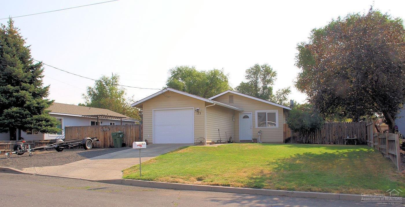 Take a look at this cute like cottage, 2 bed, 1 bath home that has been nicely redone w/an updated kitchen, full tile backsplash, laminate wood flooring that flows into the living & hall. Large master bedroom. Full walk in laundry/utility room w/ample storage. Forced air, single car finished garage with man door. 2 patio areas great for entertaining, large yard with endless possibilities. Extra parking space great for toys/RV. All sitting on a lot located close to walking paths, parks, schools and downtown.