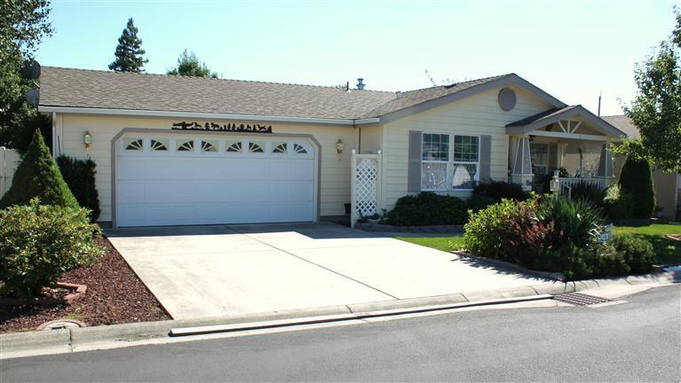 Welcome to this beautiful home in the 55+ community of Miller Estates! This 3 bedroom/2 bath, Energy Star home is 1608 sq.ft. The large kitchen is open and has plenty of natrual light with the skylights above. The backyard has a covered patio with a water feature and a garden in the back. Family room, large garage