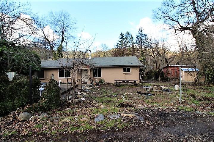 Like new, completely remodeled affordable home on almost an acre with Thompson Creek running through the property! Super sweet cottage, 2bd, lbth, on .71 of an acre with room to grow. Lots of mature landscaping makes it private from the road but allows for mountain views. Two good size outbuildings, one is a small barn other is old workshop. Nice level areas to garden or fence in for animals. Buyer to due diligence regarding irrigation rights from Thompson creek.