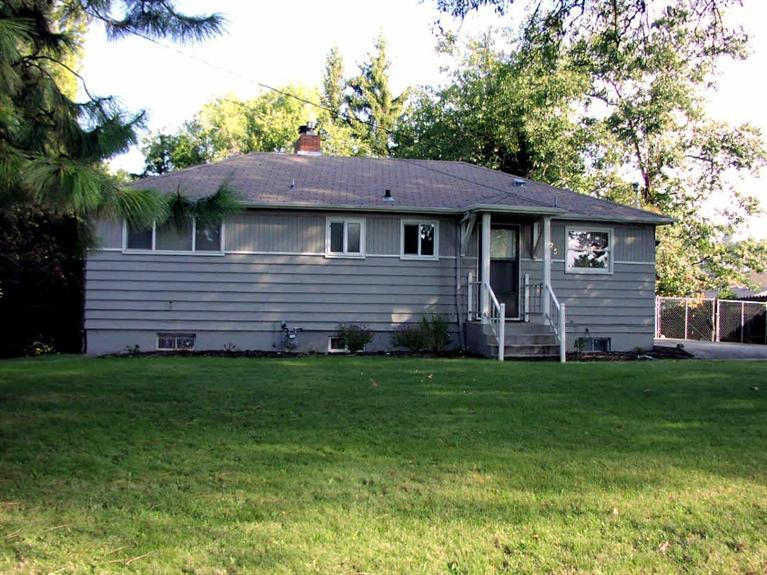 Great Location, Great Opportunity close to Lone Pine Elementary. 2336 S.F. Home includes a 3 Bedroom 2 Bath home, and a 1 Bedroom 1 Bath lower Suite with Kitchen, and it's own entrance. This .71 Acre location also includes an approved (but expired) plat. Split the lot, and build more. Don't miss this one! Large Family, Rental, Development you choose.
