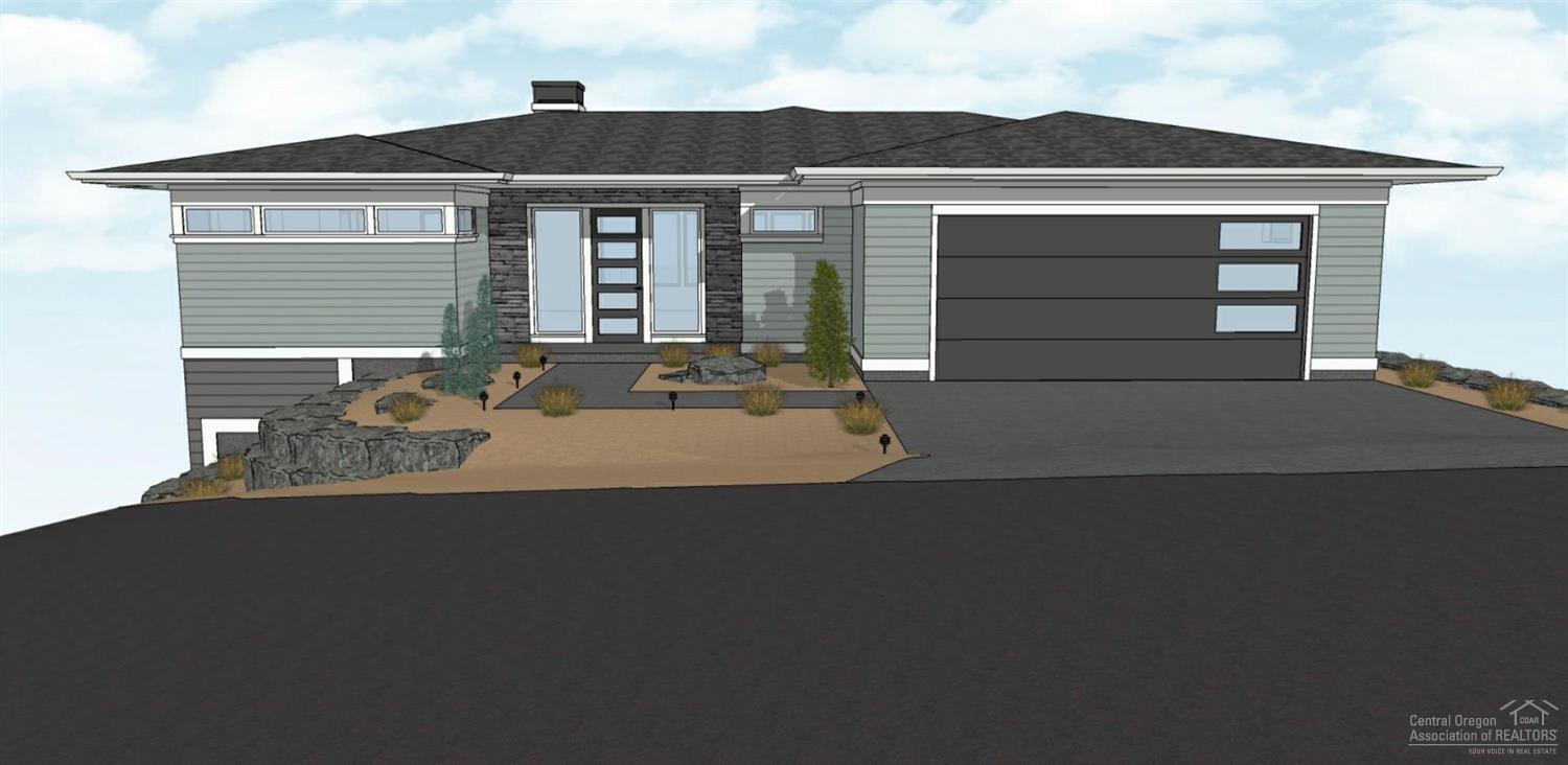 Stunning Prairie style home in River's Edge with views of the Ochoco Mountains, Pilot Butte and the first fairway. Built by award winning Structure Development NW. Open floor plan with abundant natural light and modern finishes. Great room with gas fireplace and built-ins. Chef's kitchen with oversized island, professional series appliances and lots of storage. Spacious dining area and large deck with covered area for outdoor entertaining. Master suite on main level featuring tiled shower and large walk-in closet. Expansive lower level features a large bonus room, three bedrooms, and full bath. Hardwood floors in main living area. Custom cabinetry, solid surface Quartz counters, high end lighting and plumbing fixtures throughout. Italian porcelain tile floors in bathroom, laundry and mudroom. Triple-car tandem garage and fully landscaped. Earth Advantage certified.