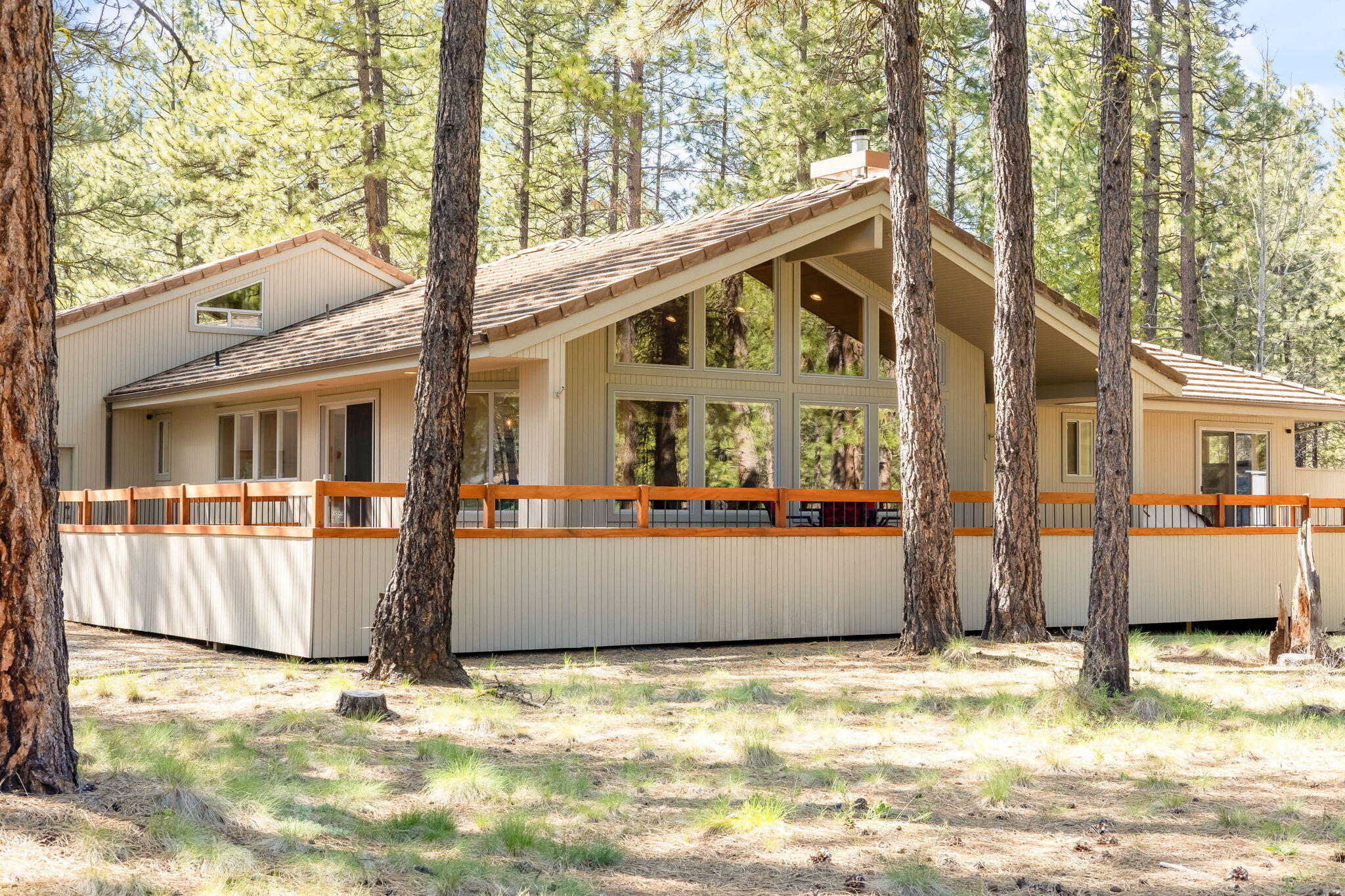 Glaze Meadow Golf Course Frontage. This single level 4 bed, 2.5 bath, 2410 sq ft home w/attached 3-car garage is beautifully situated overlooking the 7th Green and is conveniently close to both the Glaze Meadow Recreation Center and the Glaze Meadow Golf Course Pro Shop/Driving Range. National Forest is across the street. The home features natural wood siding, tile roof, extensive, partly covered, exterior decks w/Hot Tub and a warm inviting Great Room interior. Recently updated carpets, flooring, paint, appliances and refinished decks make the home move-in ready to enjoy the best of the upcoming season. The Great Room offers vaulted, clear cedar ceilings, a slate hearth w/wood stove, builtin library shelves, a breakfast bar and large dining area. The open kitchen has ample countertops and storage spaces, great natural light and easy access to the outside decks. There is a large Bonus Room/4th bedroom upstairs over the garage. A truly great location for your Black Butte Ranch Getaway!