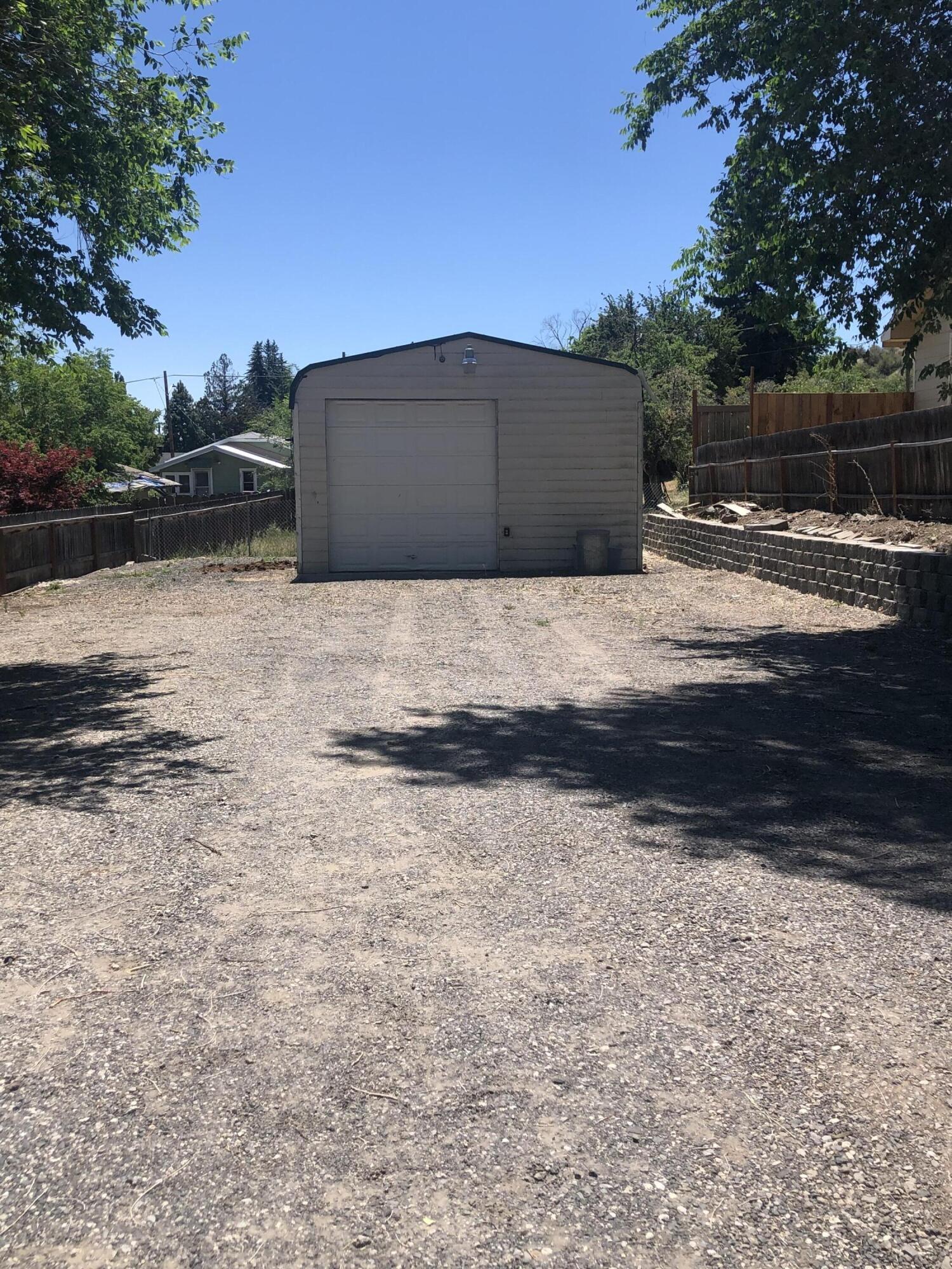 Great lot zoned SF with an 18'x21' shop/garage.