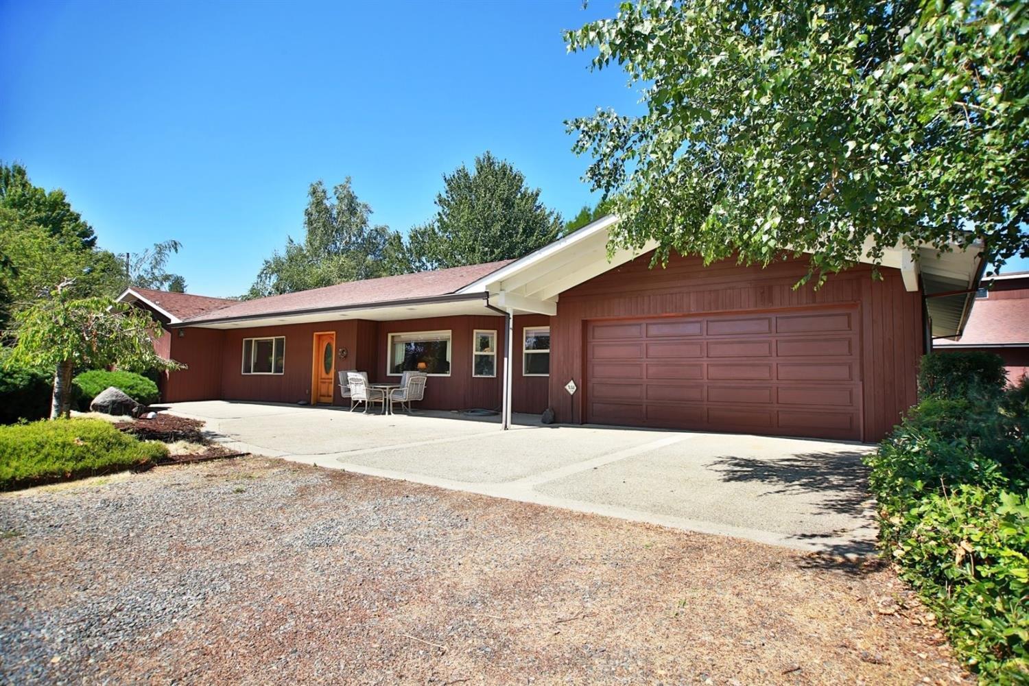 Gigantic Shop, Large Home and Water rights. Everything is included right down to the forks and knifes. Beautiful custom built home in 1990 with 3 bedrooms and 2.5 baths, 2275 sq. ft. Gigantic Shop of 54 feet by 42 feet wide and a loft measuring 27 ft. by 54 ft. Custom built cabinets throughout the home. the bedrooms accommodate king size bed and furniture. The third bedroom has a murphy bed built in. Sub-Zero refrigerator, freezers, washer and dryer are just some of the appliance included. You could literally walk in with your clothes and have everything you might need. Truly a gem. There is about 4.5 acres of grass hay that is flood irrigated with great water right. Most years there is three cuttings.
