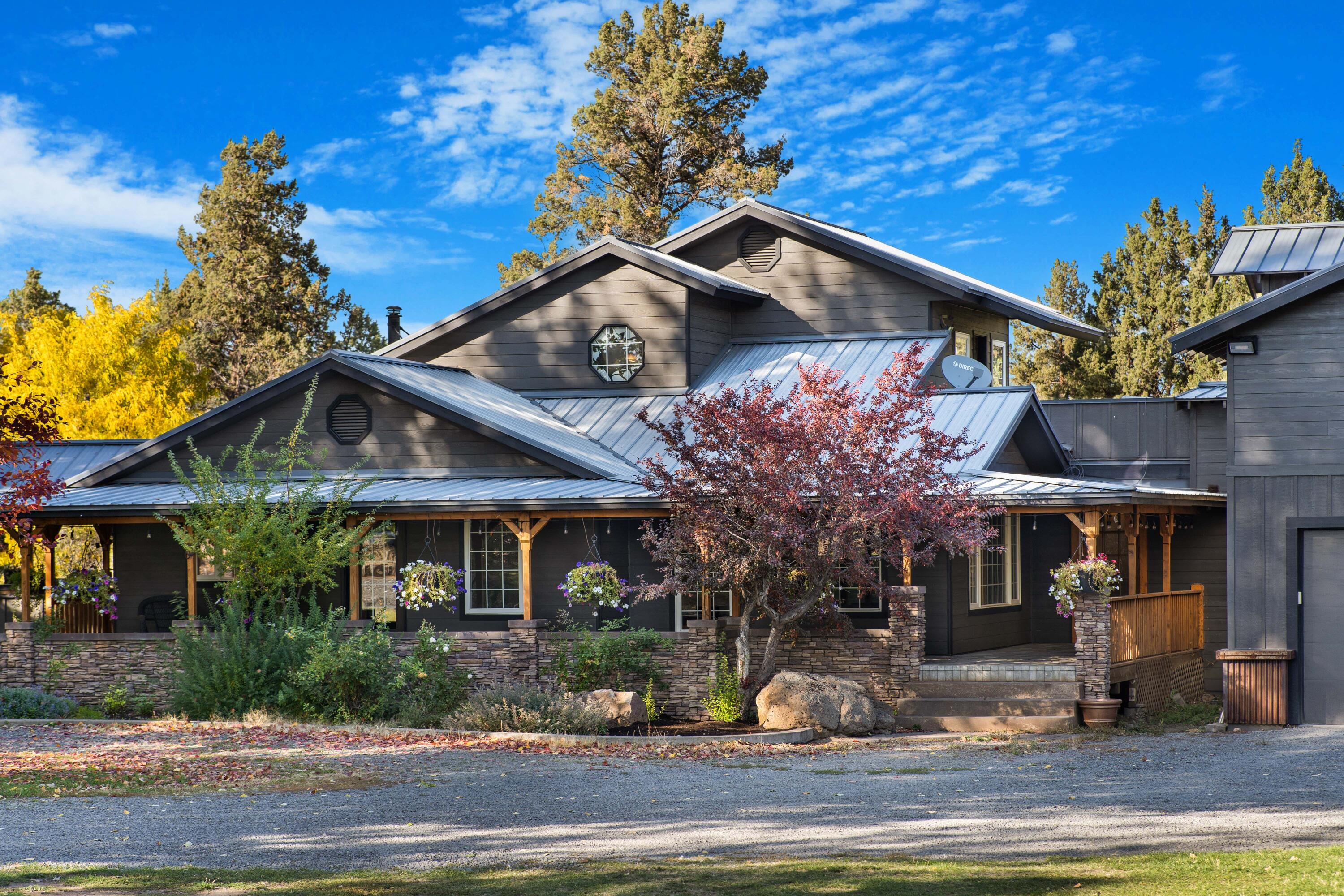 This charming and picturesque property combines elements of agriculture, rural living, and recreational activities. It's time to create your very own hobby farm! This lovely property has 3 acres of irrigation, 5 acres of land offering ample space for the venture of animals, gardening, farming, or just enjoyment. The property has a 30X60 green house with its own electrical panel and automated fans, detached shop area, storage for RV and all recreational toys. If you are a person who likes to entertain this 3800+sqft residence is just the place for you. With an open concept floor plan that offers an even flow from the kitchen to the living room, to the outdoor patio area, the bustle of company will not feel overcrowded.  Embrace the serenity of what this little hobby farm has to offer. Make your appointment today to view this tour stopping home.