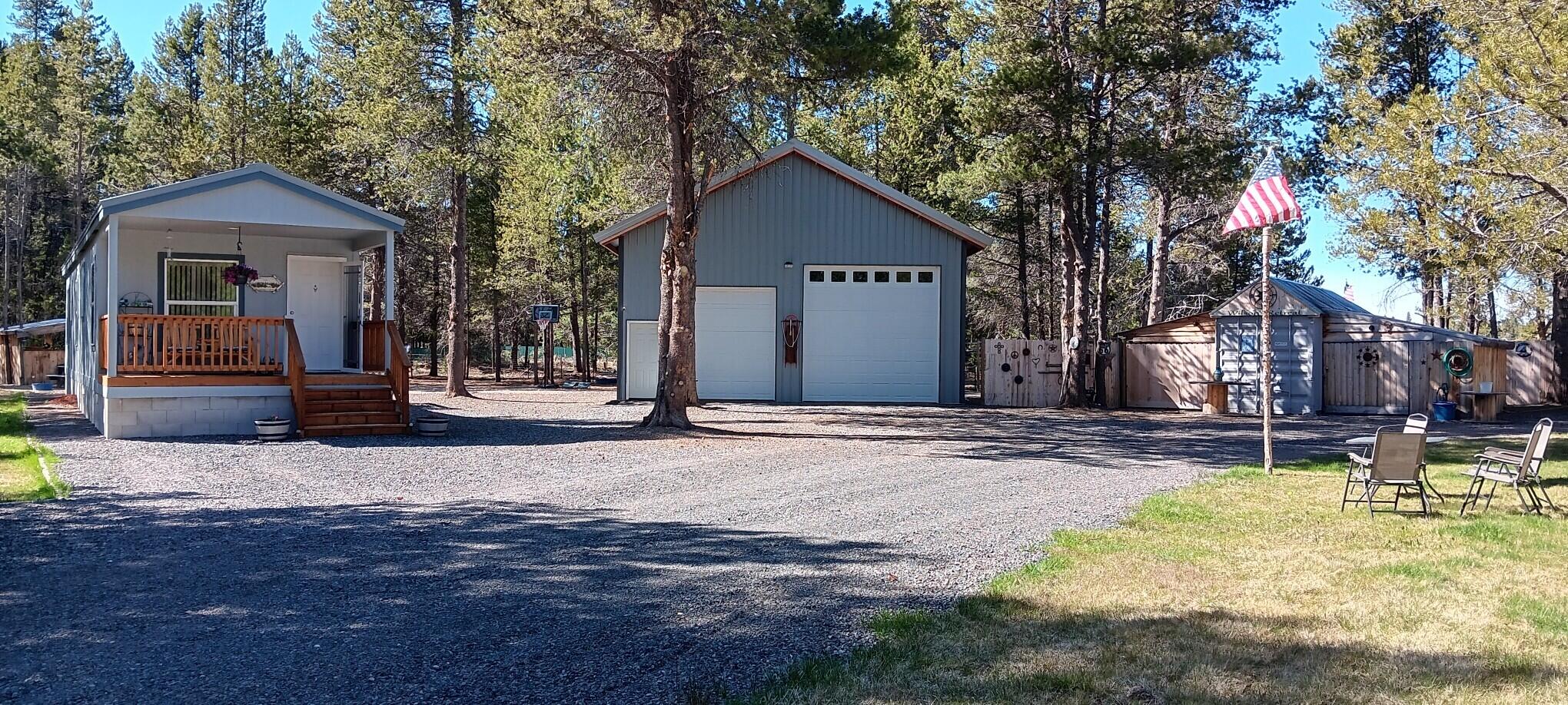 CHARMING 2- BEDROOM, 1- BATH SINGLE-WIDE ON 1.13 ACRES- MT. SCOTT MEADOWS--- NORTH OF CHILOQUIN !!

Nestled in the peaceful Mt Scott Meadows subdivision, this well- maintained 728 SF 2-bedroom, 1-bath MF sits in a beautiful 1.13 acre park-like setting.  The property features a 24 x 30 shop with heavy-duty trusses, two large doors, a metal roof, interior room, and loft- perfect for projects or storage. 

Upgrades include a durable 6'' fixed concrete slab, metal roof, two inviting porches, newer septic system and well.  The lot is fenced with plenty of gravel for easy maintenance, has a manicured mix of trees, and an additional bunkhouse/storage unit for extra flexibility.  

This is a rare opportunity for a peaceful country living.