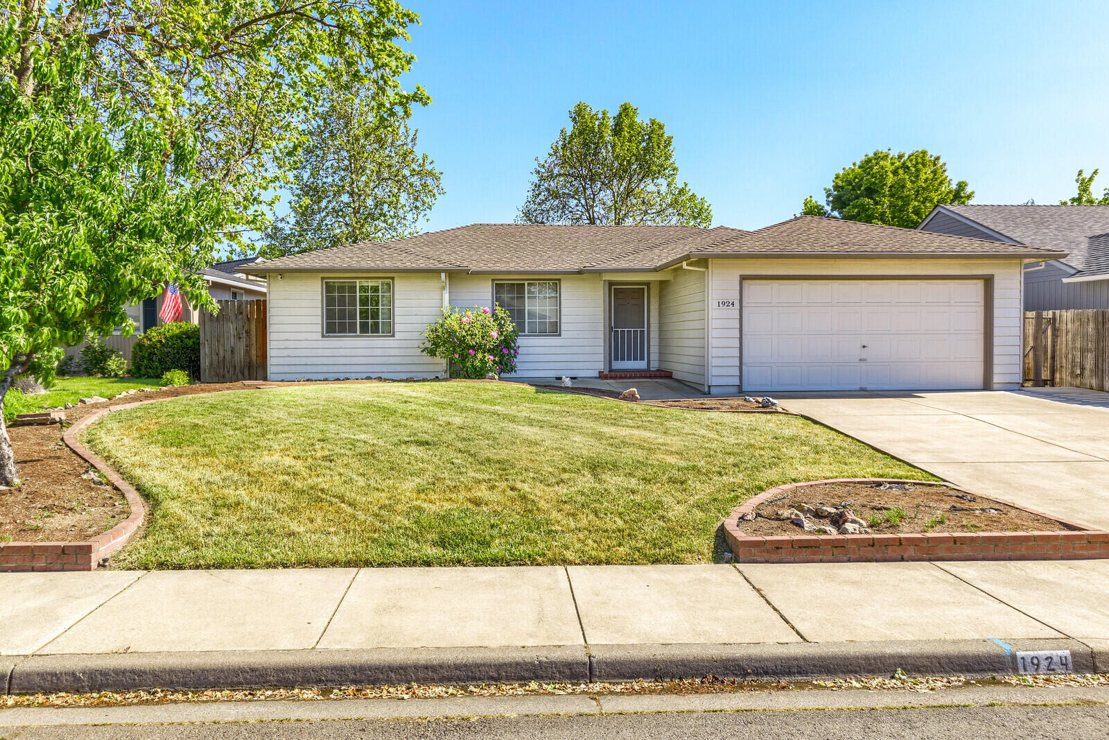 This is a great 3 bedroom, 2 bath home in a convenient East Medford location close to schools (North High District), shopping, medical and entertainment. It's situated on a large .21 acre lot with a huge backyard and covered patio to enjoy! The 50 year roof is only eight years old and a new HVAC system was installed in 2021, both should provide many years of worry-free service (roof warranty is transferable to the new owner). The home offers a nice open layout with bar seating in the kitchen and ample natural light throughout. The master suite is complete with a private bathroom and nice size walk-in closet. As an extra, the fridge, washer and dryer are all included in the sale. The home could use some TLC to really shine but it's priced accordingly and sold as is.