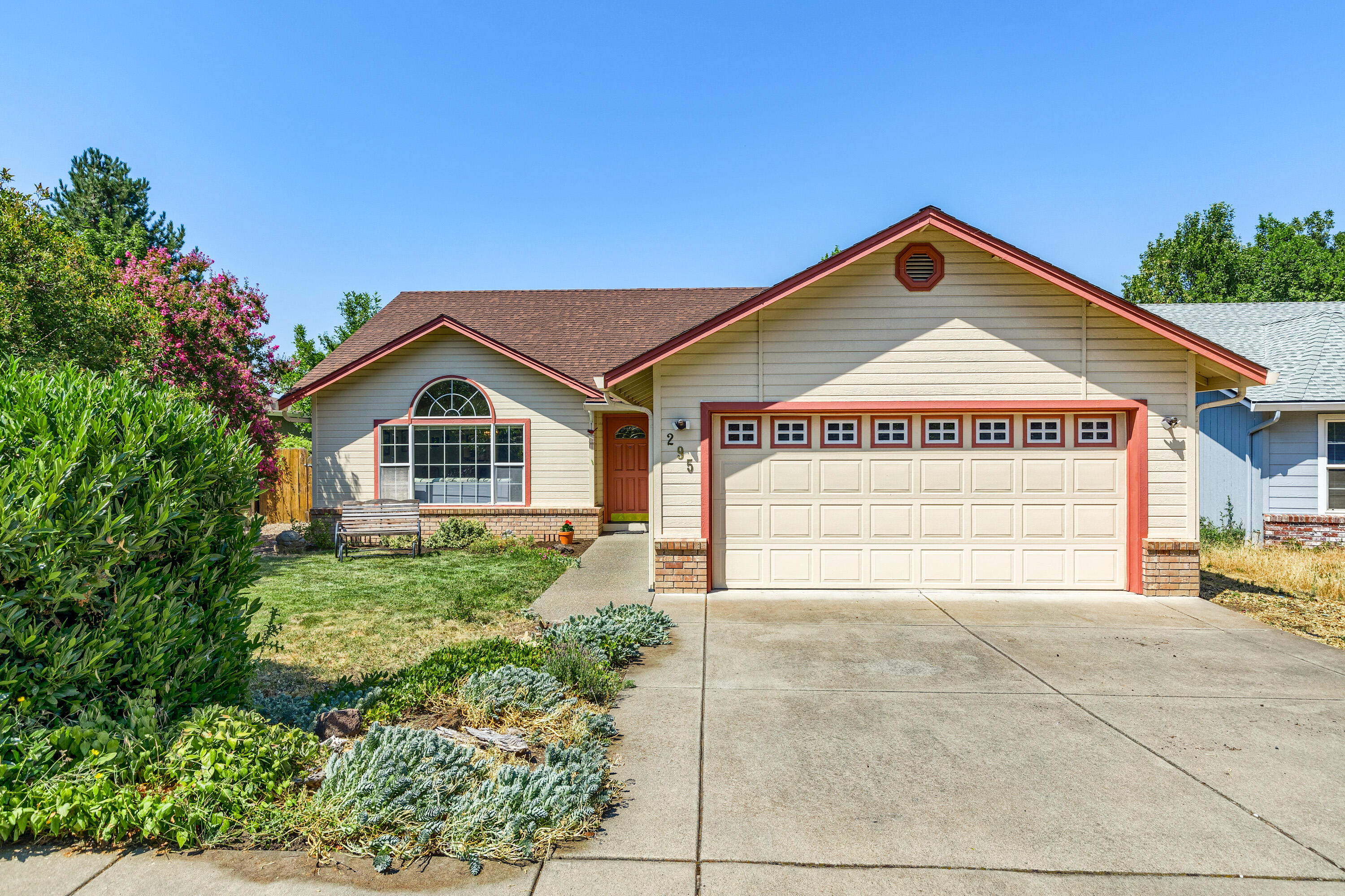 You're sure to appreciate the amazing natural light throughout this single level home. Open floor plan with vaulted ceilings in the living room and dining area. There is plenty of cabinet storage and counter-top space in the kitchen. Easy access to the fully fenced backyard off the kitchen. One of the three bedrooms offers slider access to the backyard deck. There is plenty of storage throughout the house. The backyard has raised garden beds, mature trees ensuring unusual privacy for the neighborhood. There is also plenty of room of all your outdoor entertaining needs. Two car attached garage. Located only a few blocks from Helman Elementary School. Surrounding mountain views