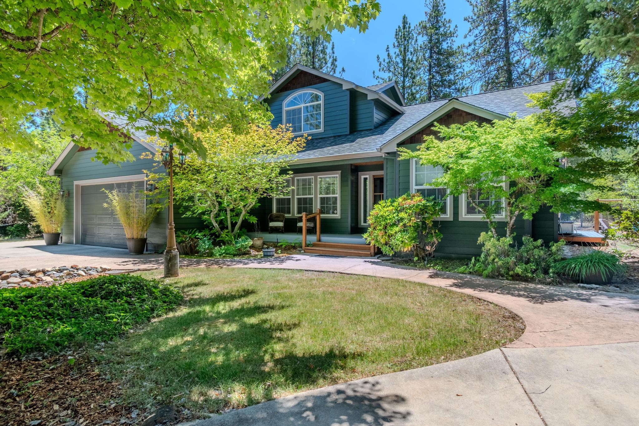 Seller to offer a $10K credit towards closing costs, buy downs or repairs!

Welcome to your dream retreat! Nestled on a private and picturesque 3.02-acre lot, this beautifully updated 4-bedroom, 3-bathroom home offers the perfect balance of comfort, space, and functionality.

Seller has recently upgraded with a brand-new roof, fresh interior and exterior paint, new carpet in bedrooms, and a brand-new septic system. This home is truly move-in ready. Enjoy outdoor living at its finest with a newly built deck, a sparkling pool and spa, perfect for summer gatherings and relaxing evenings.

Inside, you'll find a well-designed floor plan with spacious living areas, a bright kitchen, and generous bedrooms. The primary suite, located on the main floor offers comfort and privacy with an en-suite bath.

The property also includes a 1,488 sq/ft detached shop—ideal for a home business, workshop, RV/boat storage, or extra garage space.