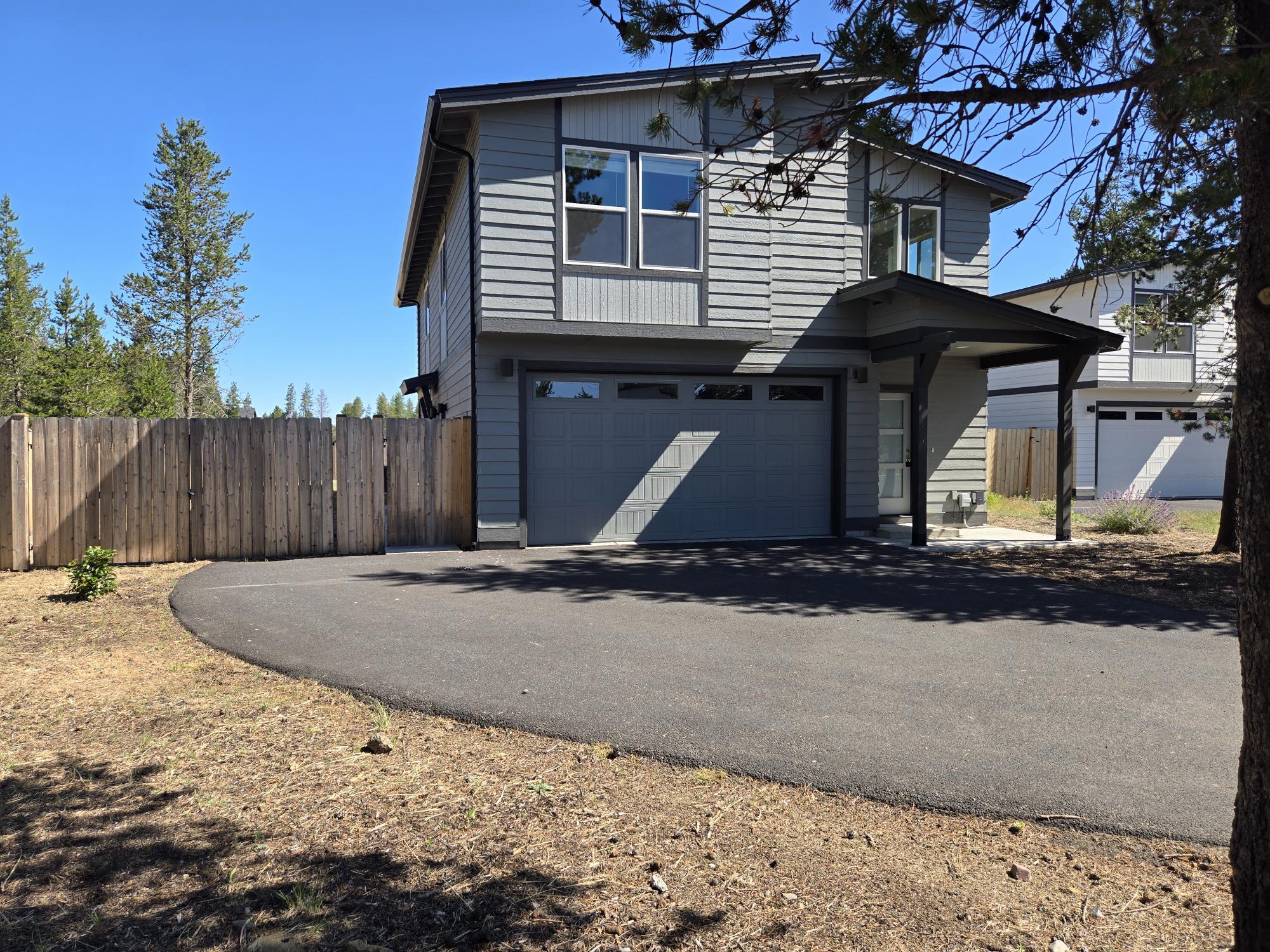 This 2022-built home in the Peaceful Pines subdivision features a main level of approximately 1,741 sq ft and a 609 sq ft attached ADU, totaling approx 2,350 sq ft. The property offers 4 bedrooms and 3 1/2  bathrooms across its layout, situated on a 0.21-acre lot. Enjoy the convenience of a modern design with an attached accessory dwelling unit. The home includes a spacious open floor plan, ample natural light, and outdoor space. Additional highlights include a two-car garage and a well-maintained exterior. Schedule a showing to explore this property!