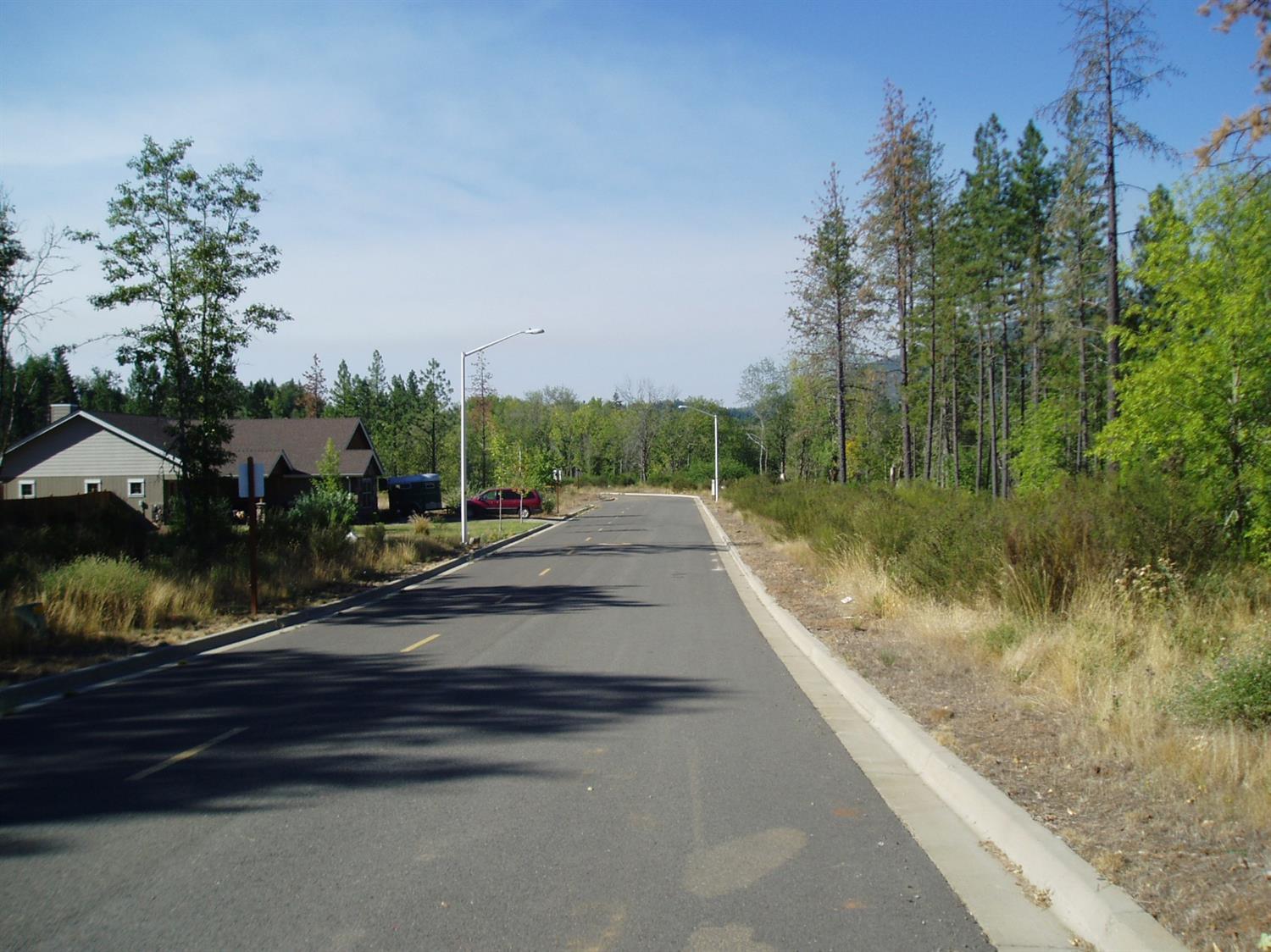 Build your dream home at/near the golf course! Right near town, too. Beautiful custom homes by various builders; your builder or we'll put you in touch. Water, sewer and power right to the property makes development inexpensive and simple. Some lots with access to the course, others with great territorial views. Buildings and Improvement to be approved by architectural control committee. Vacant Land Disclosure and CC&Rs for entire subdivision available.  Buyer to perform own due diligence on the lot of interest.