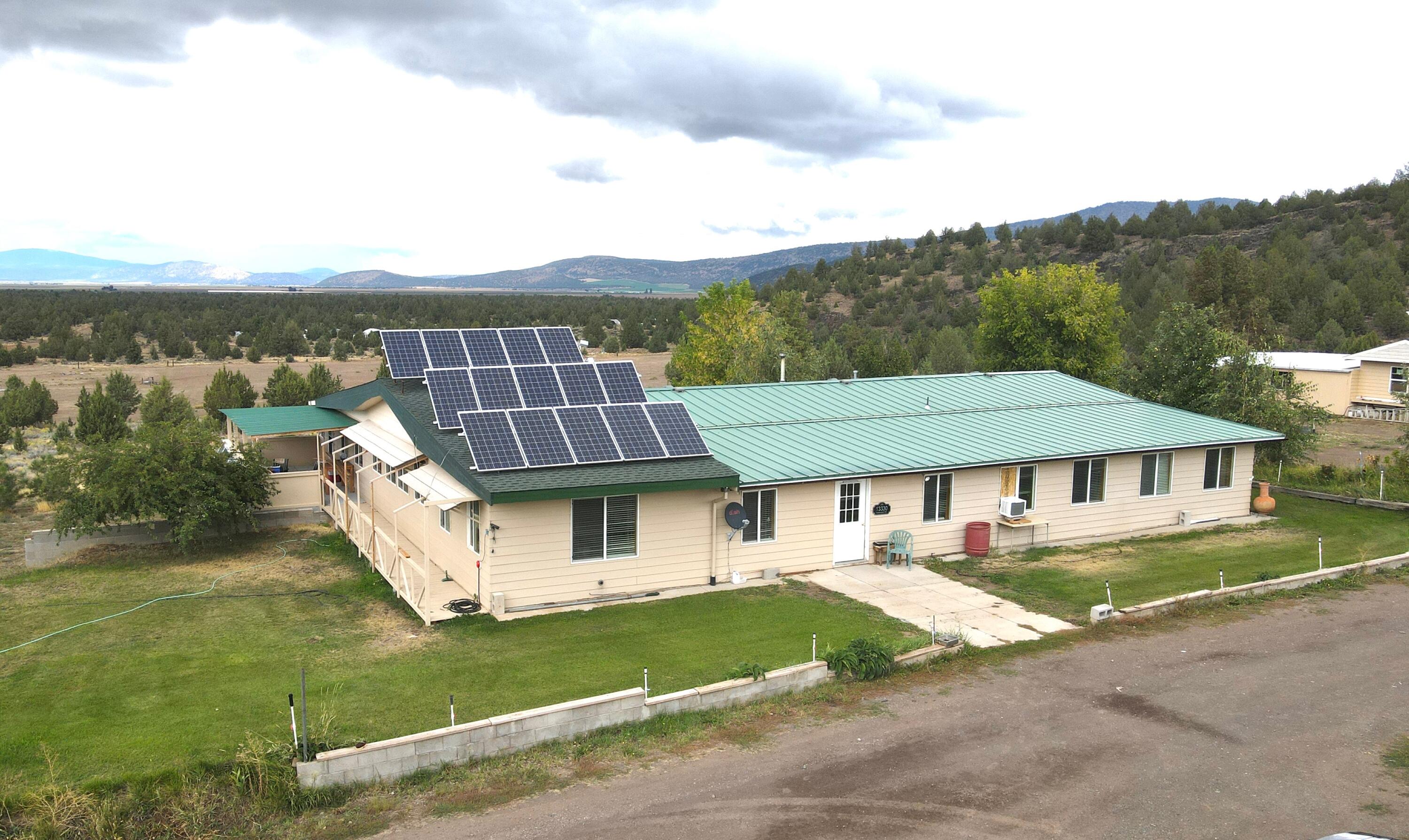 Escape to 70 private acres in Macdoel with breathtaking views and endless potential. This off-grid manufactured home is equipped for sustainable living with three wells, alternative power, and a durable metal roof for peace of mind. The fenced property offers wide open space for gardening, animals, or recreation, all while enjoying unmatched privacy and natural beauty. Features 2 horse stalls, chicken coop, separate manufactured home and fruit trees. Whether you're seeking a self-sufficient lifestyle, a peaceful retreat, or a place to build your vision, this unique property provides the perfect balance of seclusion and opportunity. CA DRE 02145244/FNR CA DRE 02074761