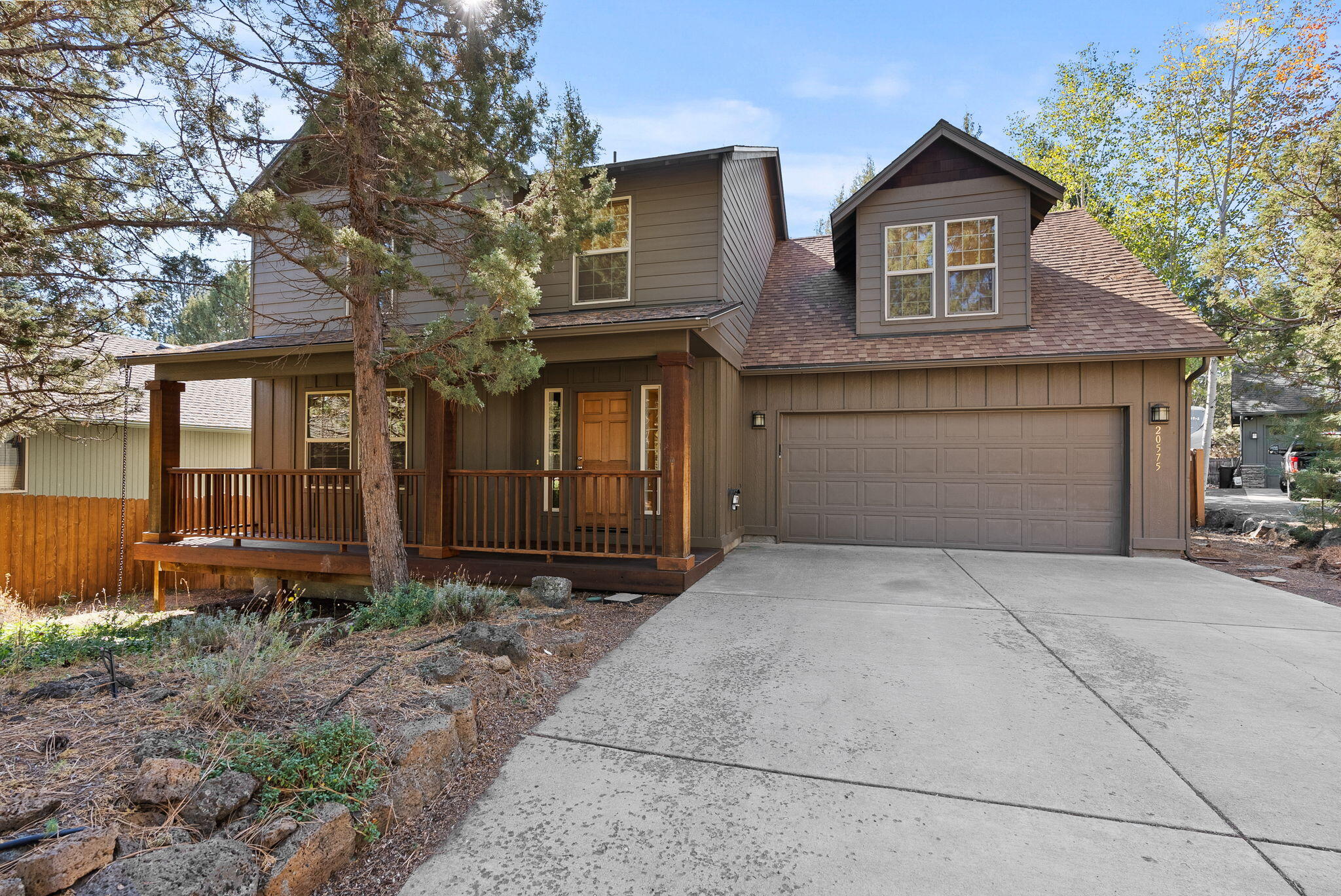 Tucked away in a tree-lined neighborhood with no HOA, this beautifully updated residence blends comfort with modern sophistication. A spacious driveway provides ample parking, including room for an RV, while the expansive, shaded yard offers endless potential for outdoor living or landscaping. Every detail has been thoughtfully curated for peace of mind & effortless living, with a new roof, furnace, & AC as well as brand-new flooring , fresh paint, and new window blinds that enhance the home's contemporary feel. The inviting main level showcases a charming fireplace and stainless steel appliances, creating a perfect balance of warmth & style. Upstairs, discover 4 bedrooms, including a comfortable primary suite. One of the bedrooms is oversized & perfect for a family room, hobby space, or playroom. Surrounded by some of the area's most desirable parks—Foxborough Park, Sun Meadow Park, Alpenglow Park, & Stone Creek Park—this home delivers both tranquility and convenience in one package.