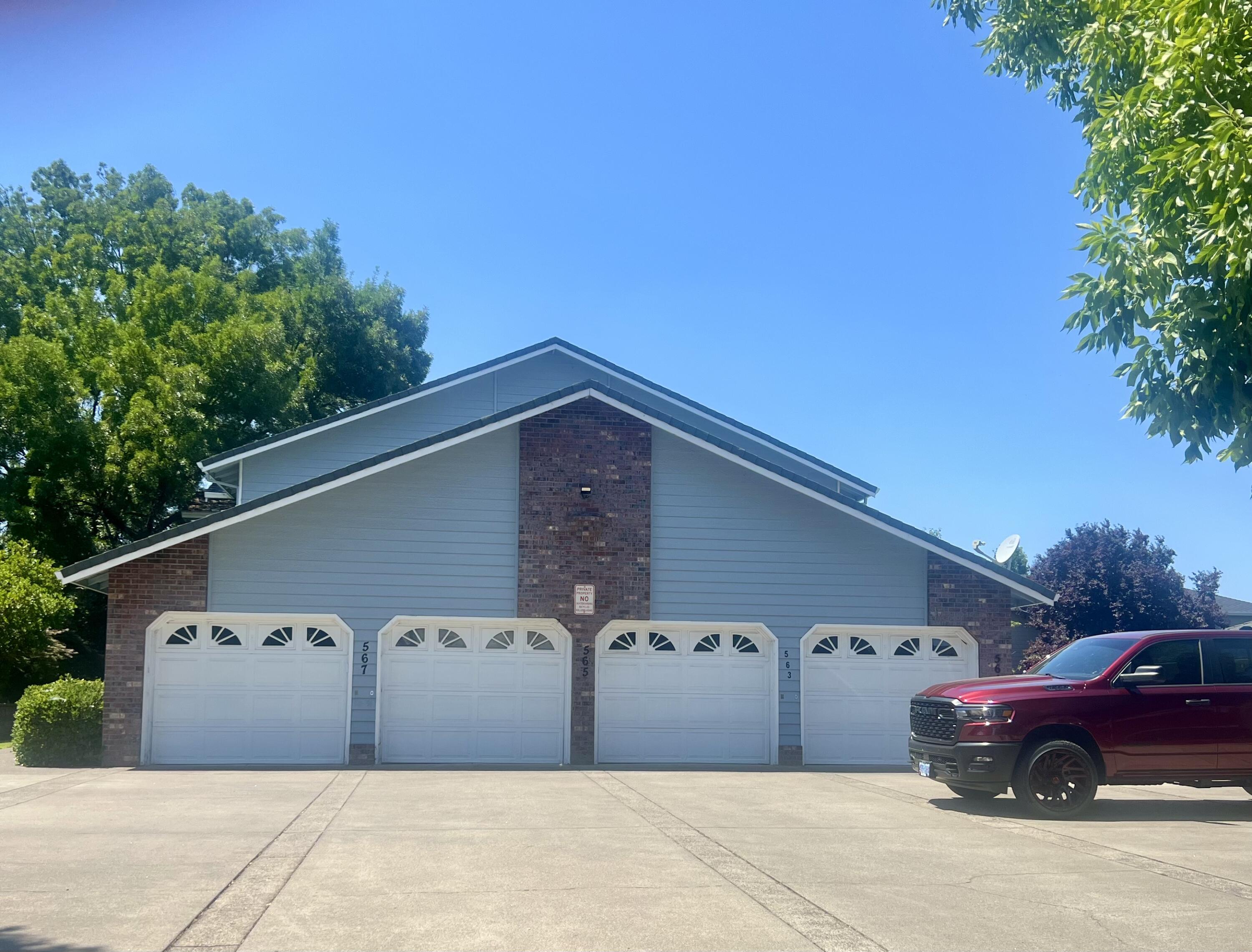 Attractive 1997-built quadplex in a desirable Central Point neighborhood, featuring a brick-and-siding exterior, manicured landscaping, and private walkway entries. This 4,232 SF two-story property offers four identical 2BD/2BA units, each with a single-car garage and separate gas/electric meters. Professionally managed with no HOA fees. Rents are $1,395/month per unit, with two long-term tenants in place since 2019 and 2020. Conveniently located near Crater High School, Don Jones Memorial Park, shopping, and dining, with quick I-5 access to Medford and the Rogue Valley International Airport.