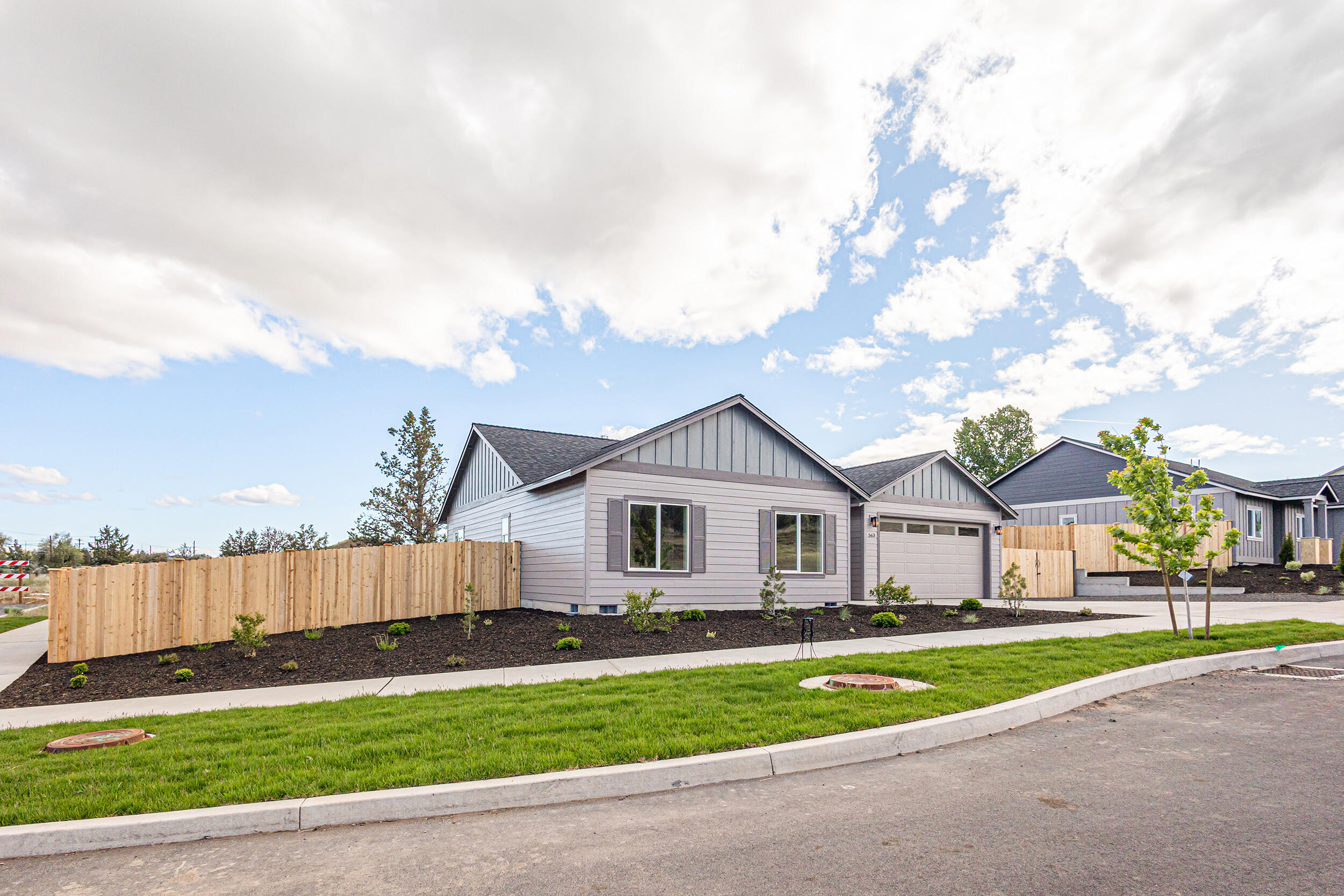 Move-in ready! $5,000 credit possible if use Keely Matteo with Crosscountry Mortgage.Park Place is a new community in SW Madras w/ trails to ''M Hill'' just outside your door & in close proximity to parks, shopping, restaurants and lakes providing scenic outdoor recreation. Lot 8 is a spacious corner lot featuring the Aspen floorplan w/ ample side yard for RV/Boat/toys. A/C & tankless water heater included as well as landscaped front yard & fenced backyard! Primary bdrm features eastern views of sunrise, box vault ceiling, walk-in closet & full bath w/ double vanity. Entertain in your kitchen w/ SS appliances, tile backsplash, quartz countertops w/ island opening to vaulted great room w/ gas fireplace, large windows & door to backyard patio. Durable laminate plank flooring thru-out w/ carpeted bdrms. Laundry/utility room too. Floorplan subject to change. *Some photos virtually staged.