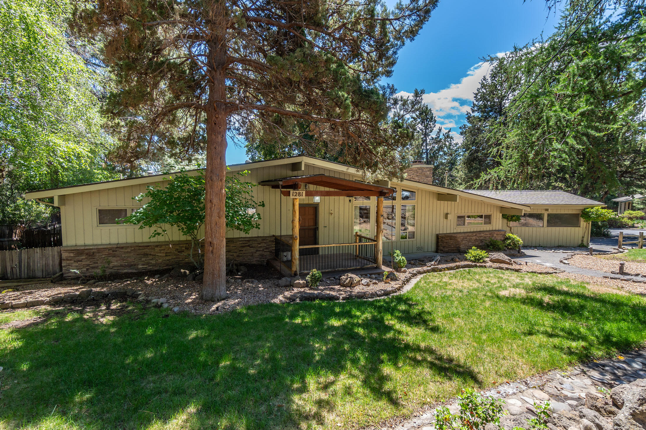 First time on the market, this one owner Atomic Ranch style Mid-Century home offers single level living on a large .33 acre lot in the highly desirable West Hills neighborhood of Bend, Oregon. Original in all ways, this 3 bedroom plus a bonus room and 2 full bath home awaits your creative design. The lot is predominantly flat and fenced with ample space to entertain and park RV's, boats, trailers, etc. 3 car garage! Own a piece of Bend's history and enjoy a wonderful lifestyle walking and biking distance to downtown Bend, Newport Ave shops, coffee houses and eateries, The Deschutes River, hiking and mountain biking trails galore!