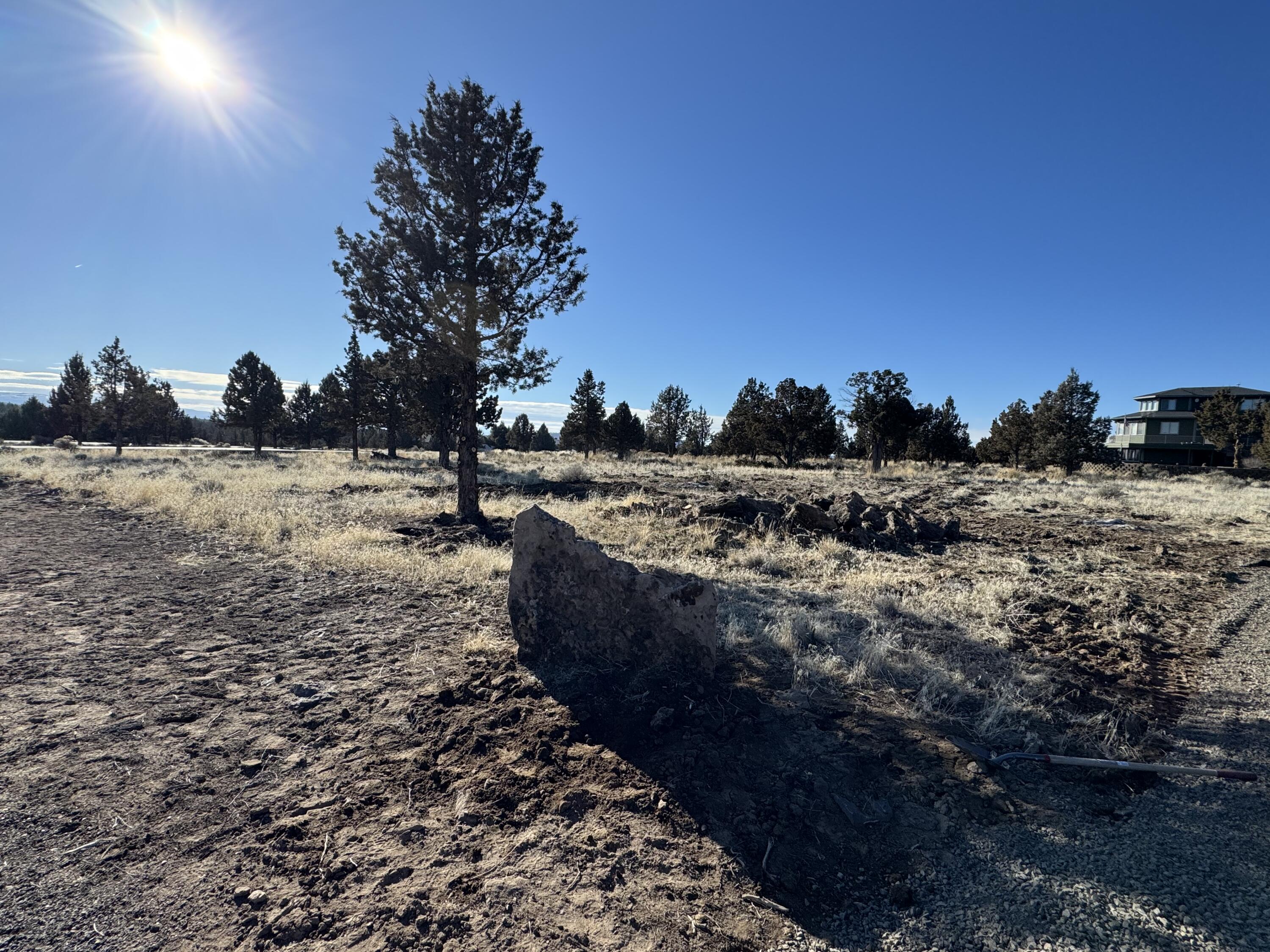 A pilot's dream! This prime buildable corner lot is perfectly positioned at the head of a 3,000' paved and lighted runway in the gated Dry Creek Airpark in Prineville, Oregon. With 300+ flyable days per year, this is your chance to build the home and personal hangar you've always wanted. The driveway and culvert are already in place, with some clearing done for easy development. Just 10 air miles from Prineville Airport (S39) for maintenance and fuel, and 15 air miles from Redmond Airport (RDM) for direct commercial flights across the West. Don't miss this rare opportunity—schedule a tour today!