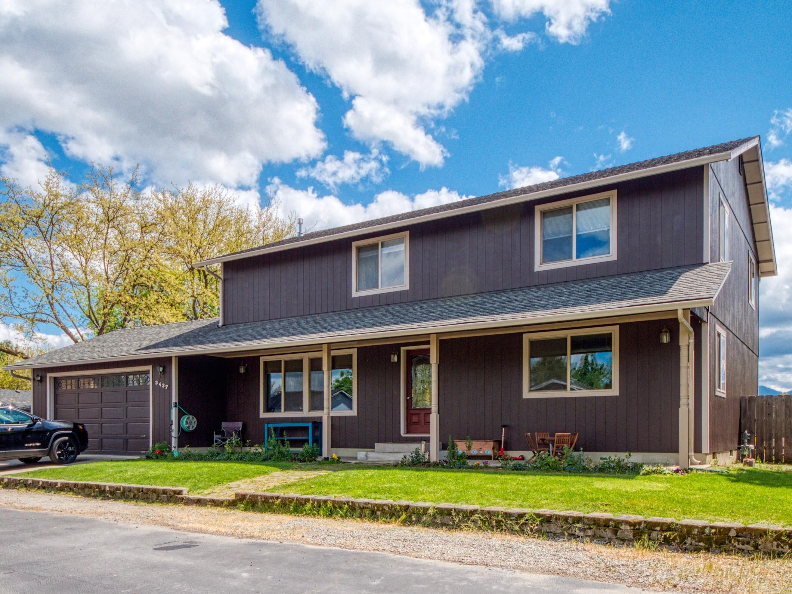Open House Saturday 5/1/21 from 10:00-3:00. Come tour this magnificent 4-Bedroom/2.5-Bathroom home with massive bedrooms, enormous RV parking and a near endless backyard. Pass over new plank laminate flooring in the well-lit living room and enter the reimagined kitchen including butcher block countertops, subway tile backsplash and a stainless steel gas range. Enjoy the size of the downstairs master bedroom with a generous walk-in closet and huge ensuite with heated tile floors, dual vanity, soaker tub, and walk-in shower with bench. Upstairs find a 2nd living area nicely complimented by the main bath and three large bedrooms. Past the french doors and onto the rear deck take in nearly 4000 SqFT of fully fenced backyard. Close to shopping, schools and medical this redone gem won't last.
